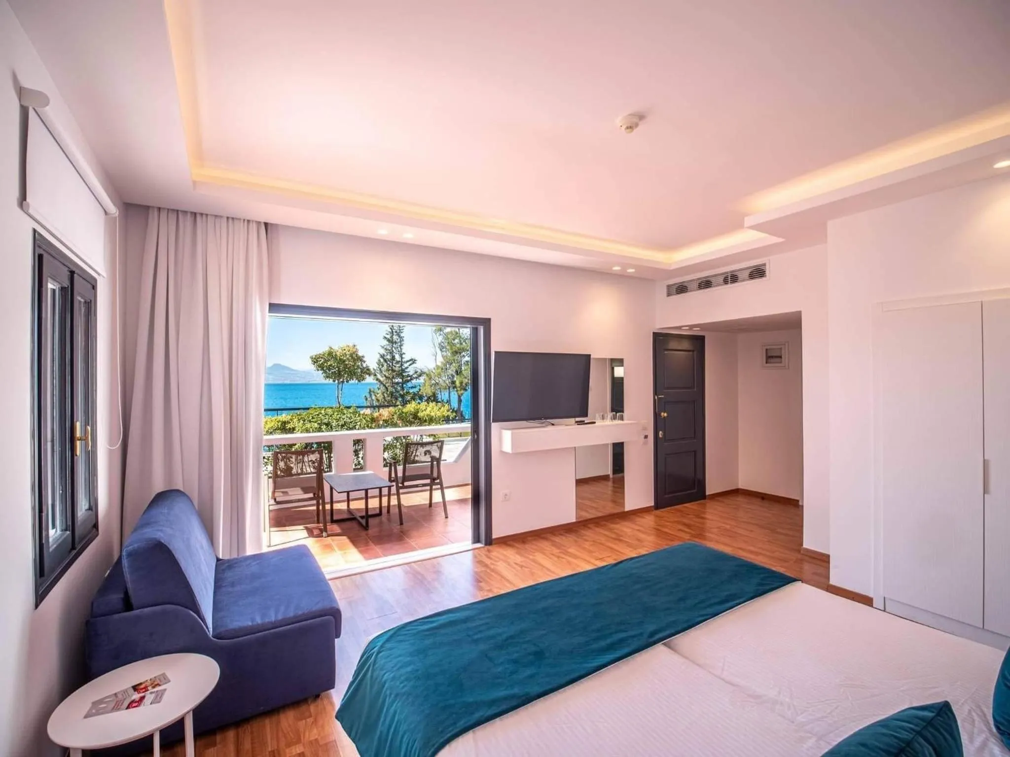 Balcony/Terrace, Bed in Ramada Loutraki Poseidon Resort