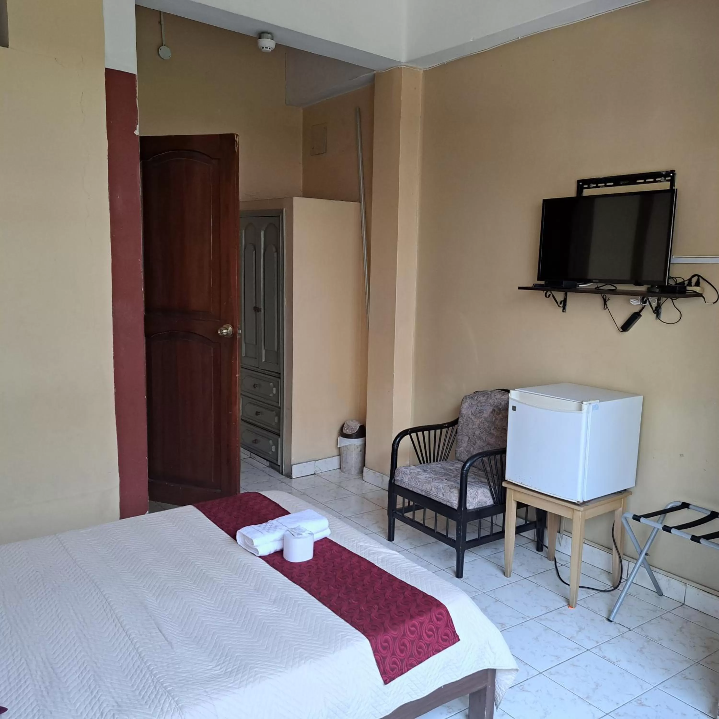 Photo of the whole room, Bed in Atlantic Suites Hotel