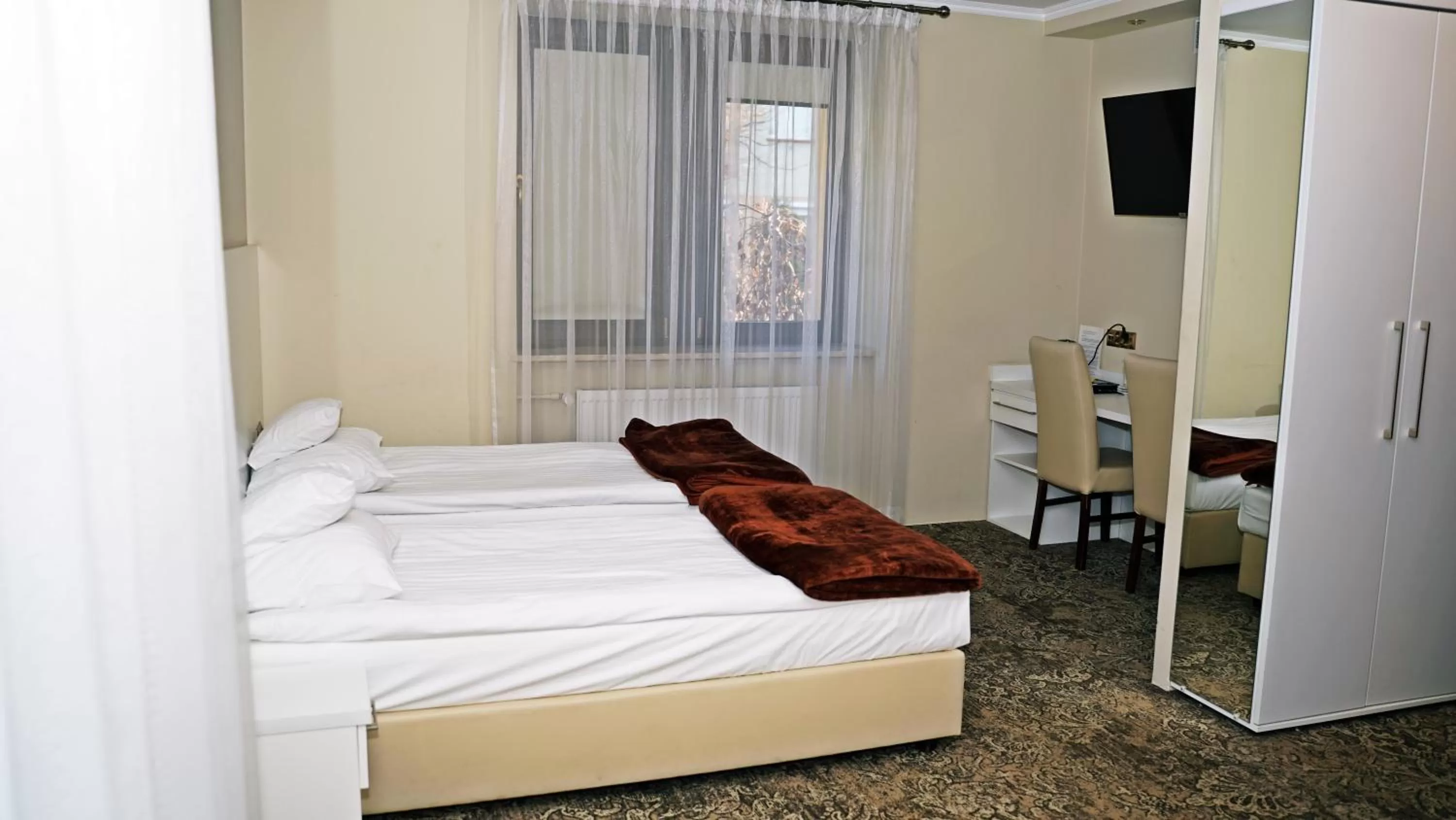 Bed in Hotel Promien