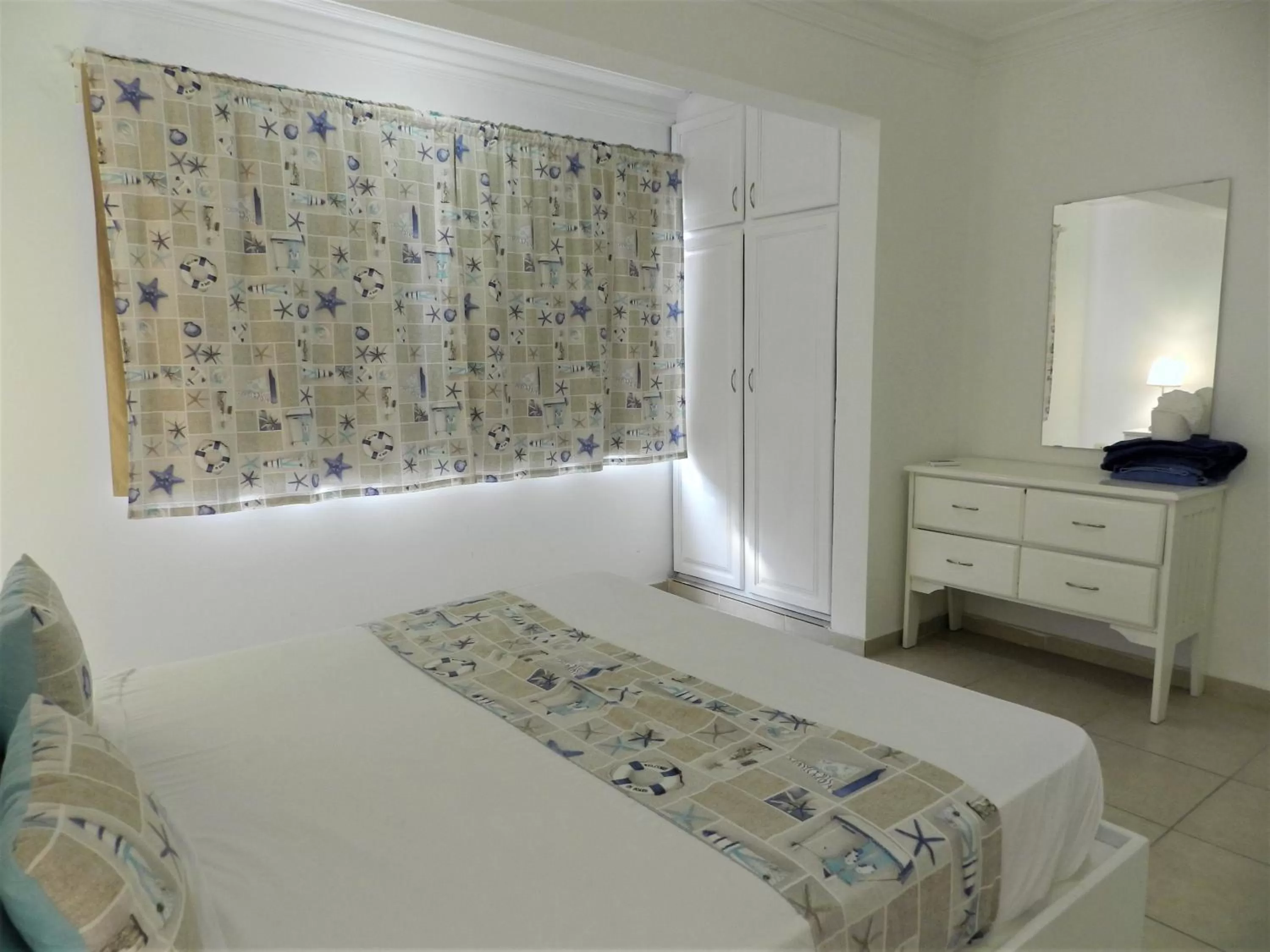 Bedroom, Bed in Karimar Beach Condo Hotel