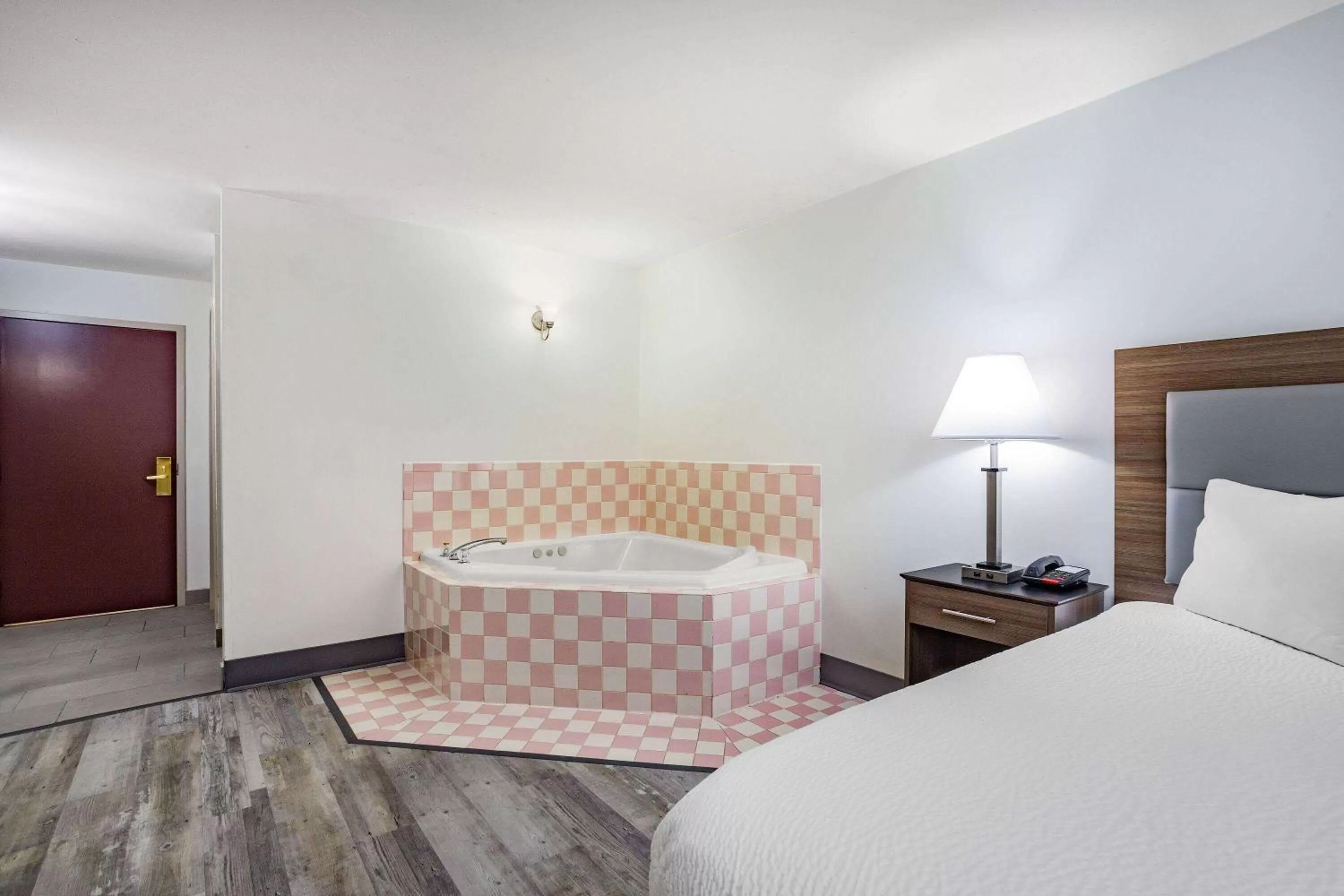 Bed in Ramada by Wyndham Hendersonville