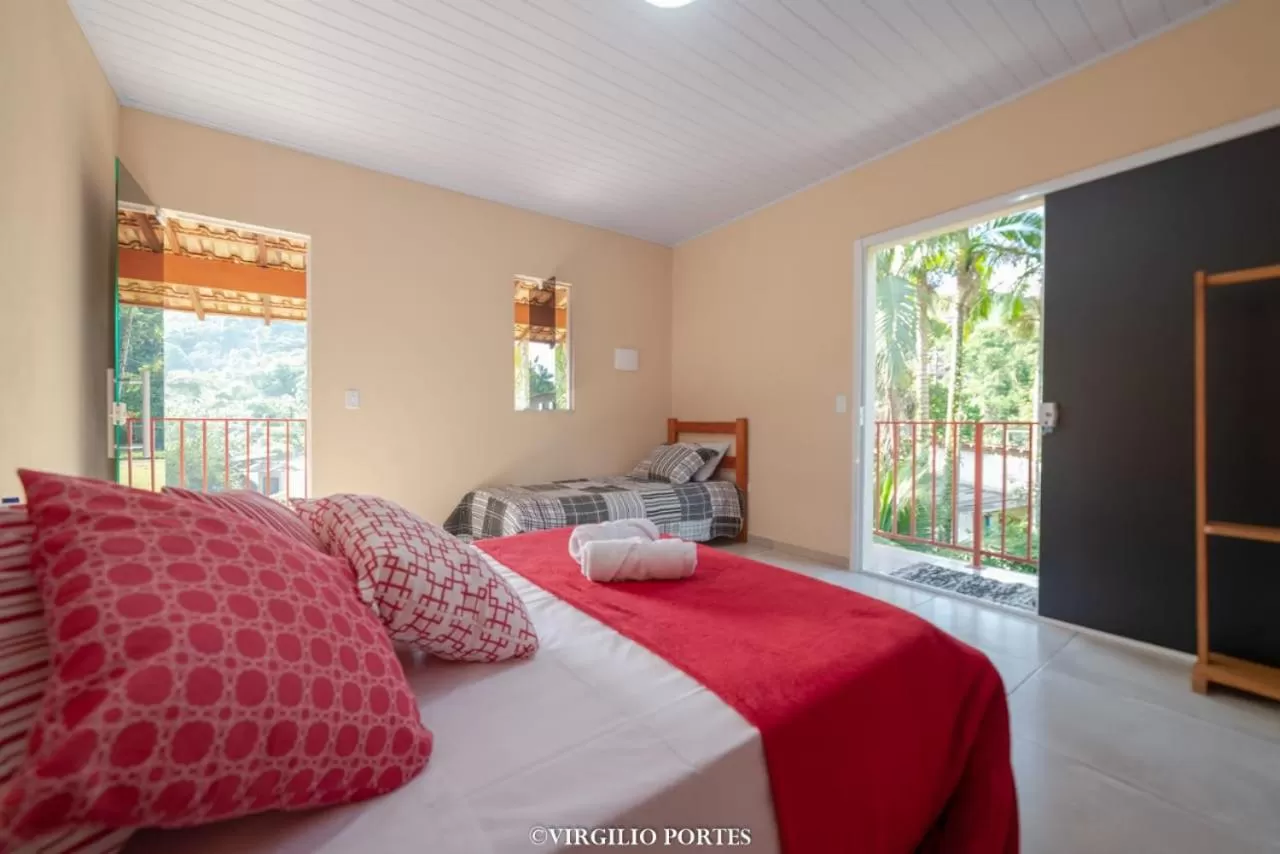 Bed in Pousada Recanto da Lu