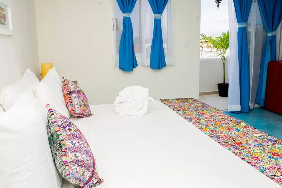 Bed in Hidalgo Boutique Rooms