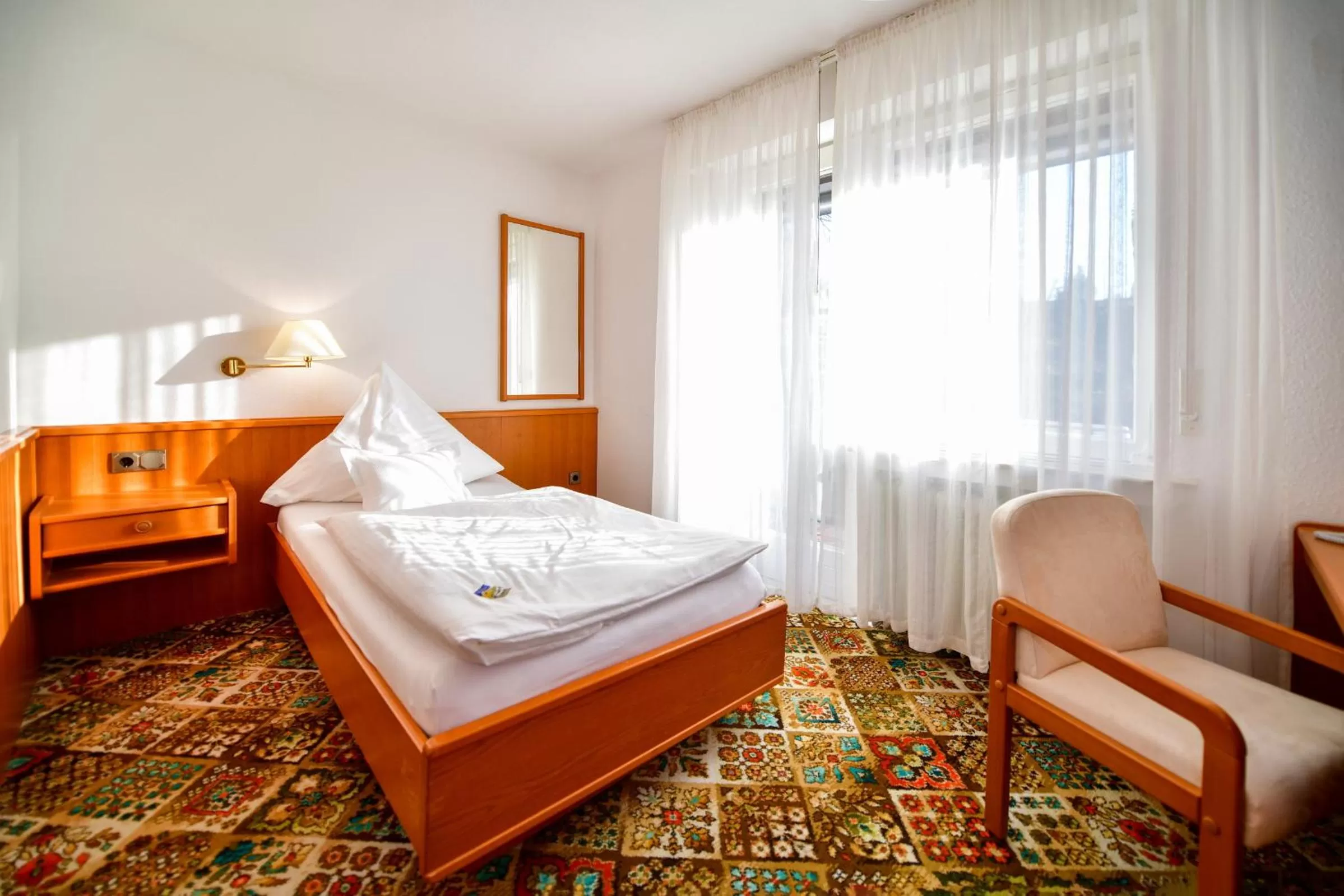 Bed in Hotel Zur Post