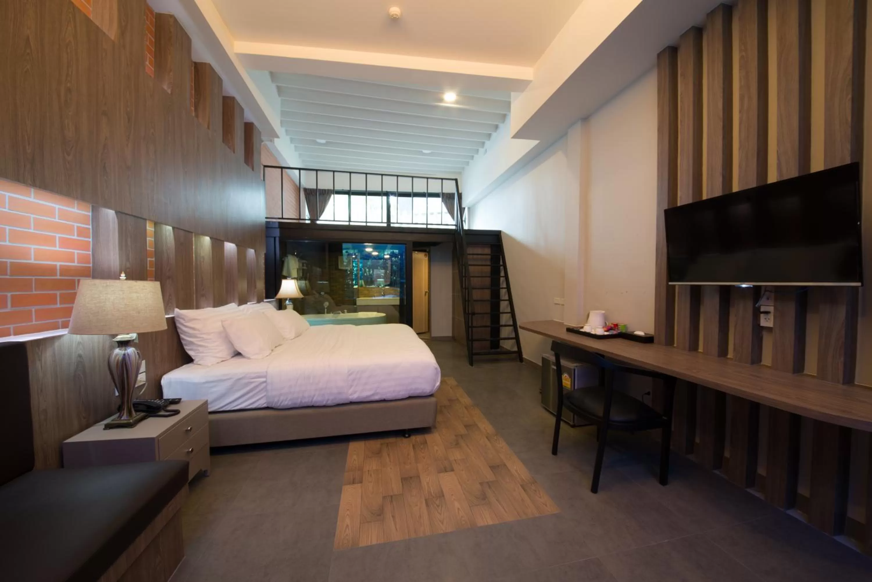 Photo of the whole room, Bed in V20 Boutique Jacuzzi Hotel