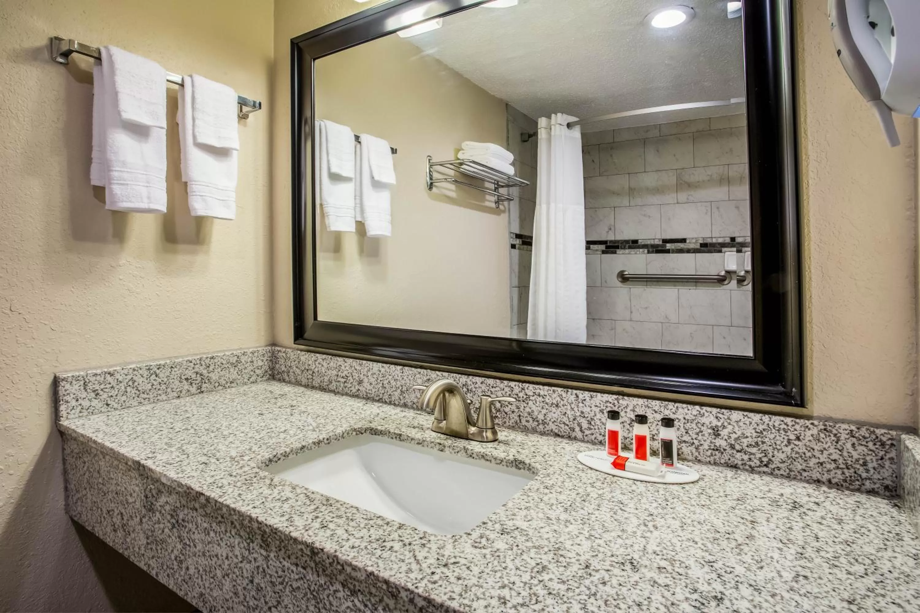 Bathroom in Super 8 by Wyndham Lake City