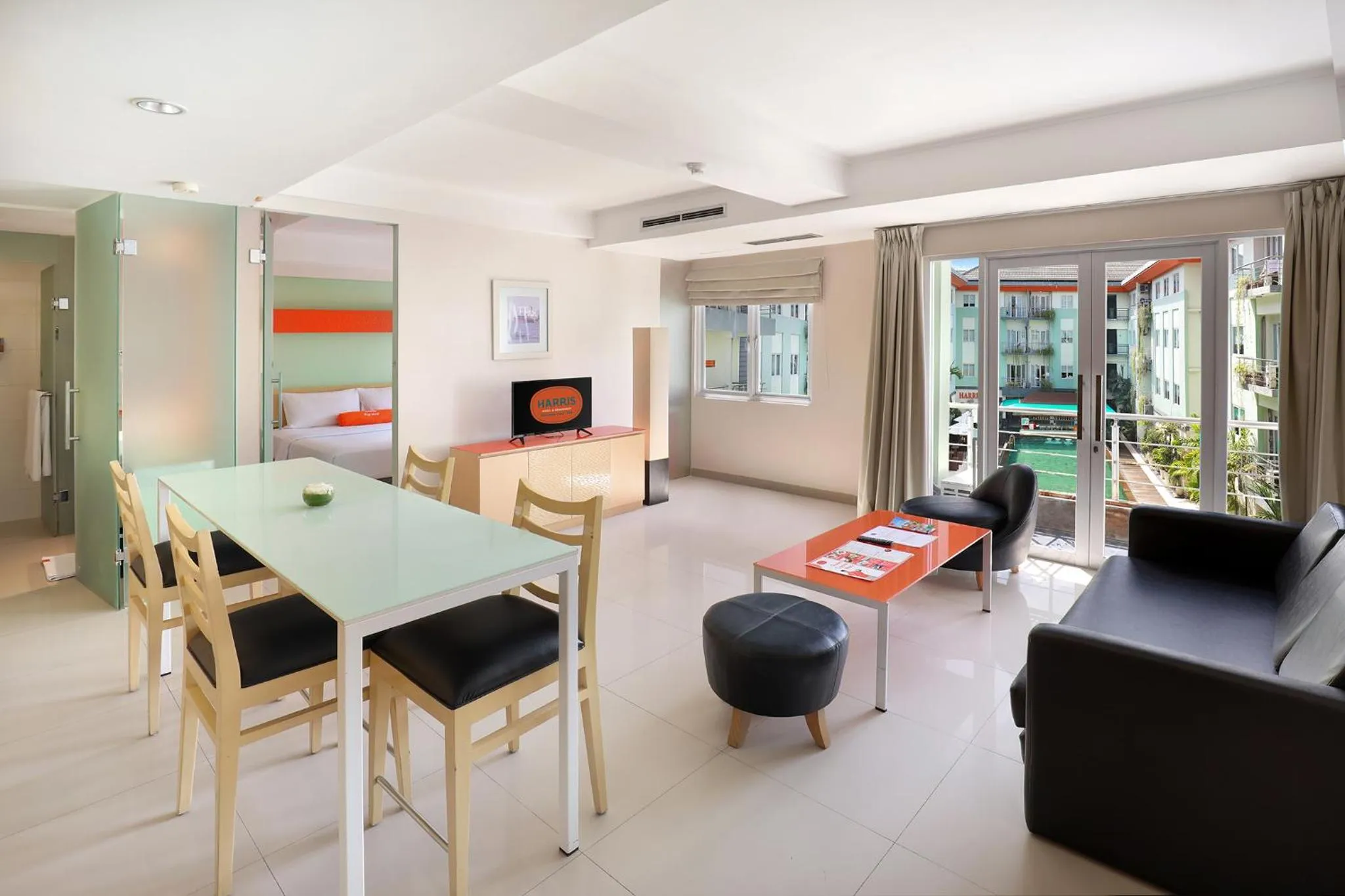 Balcony/Terrace, Bed in HARRIS Hotel & Residences Riverview Kuta, Bali