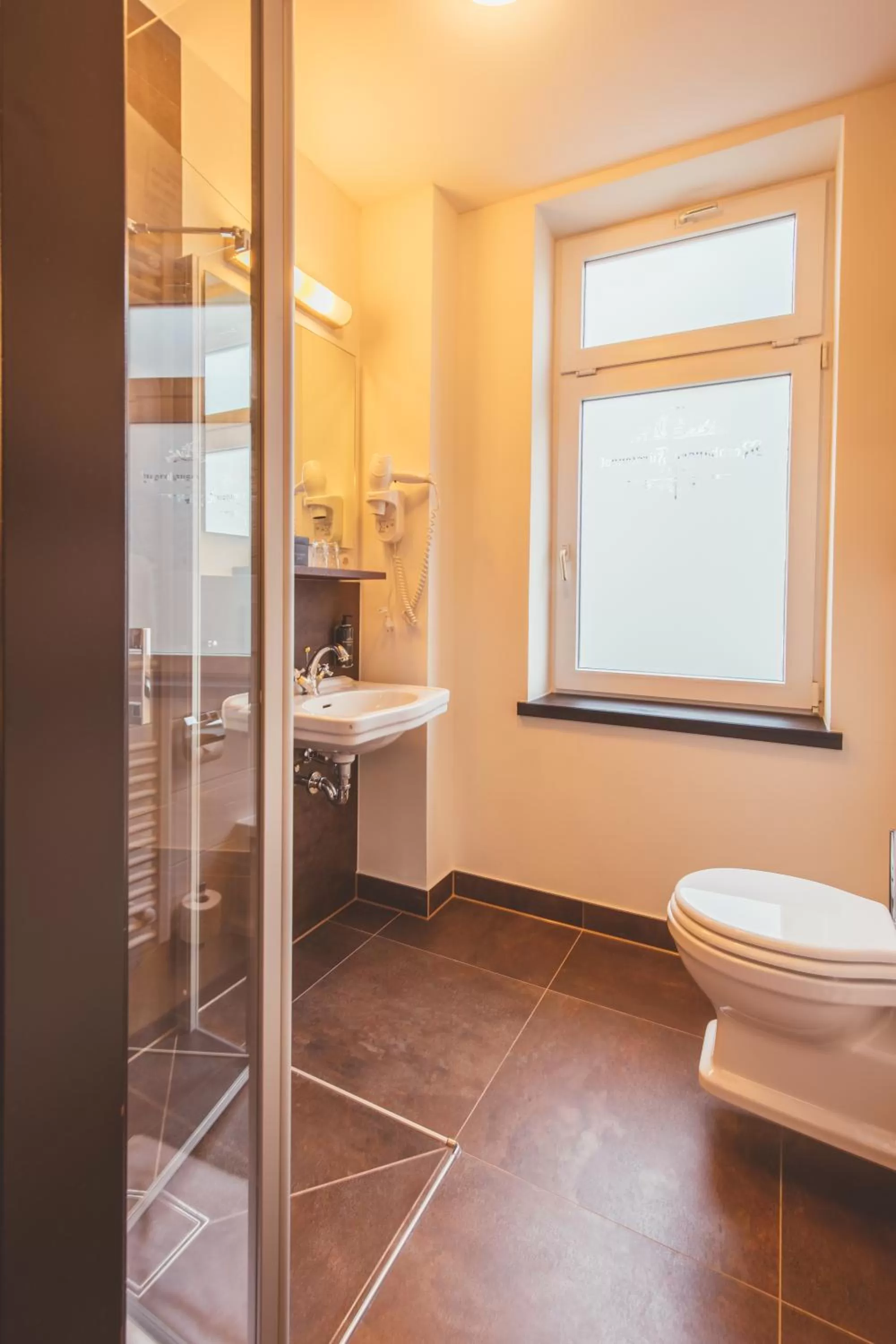 Bathroom in Nordhäuser Fürstenhof & TinySky-Resort