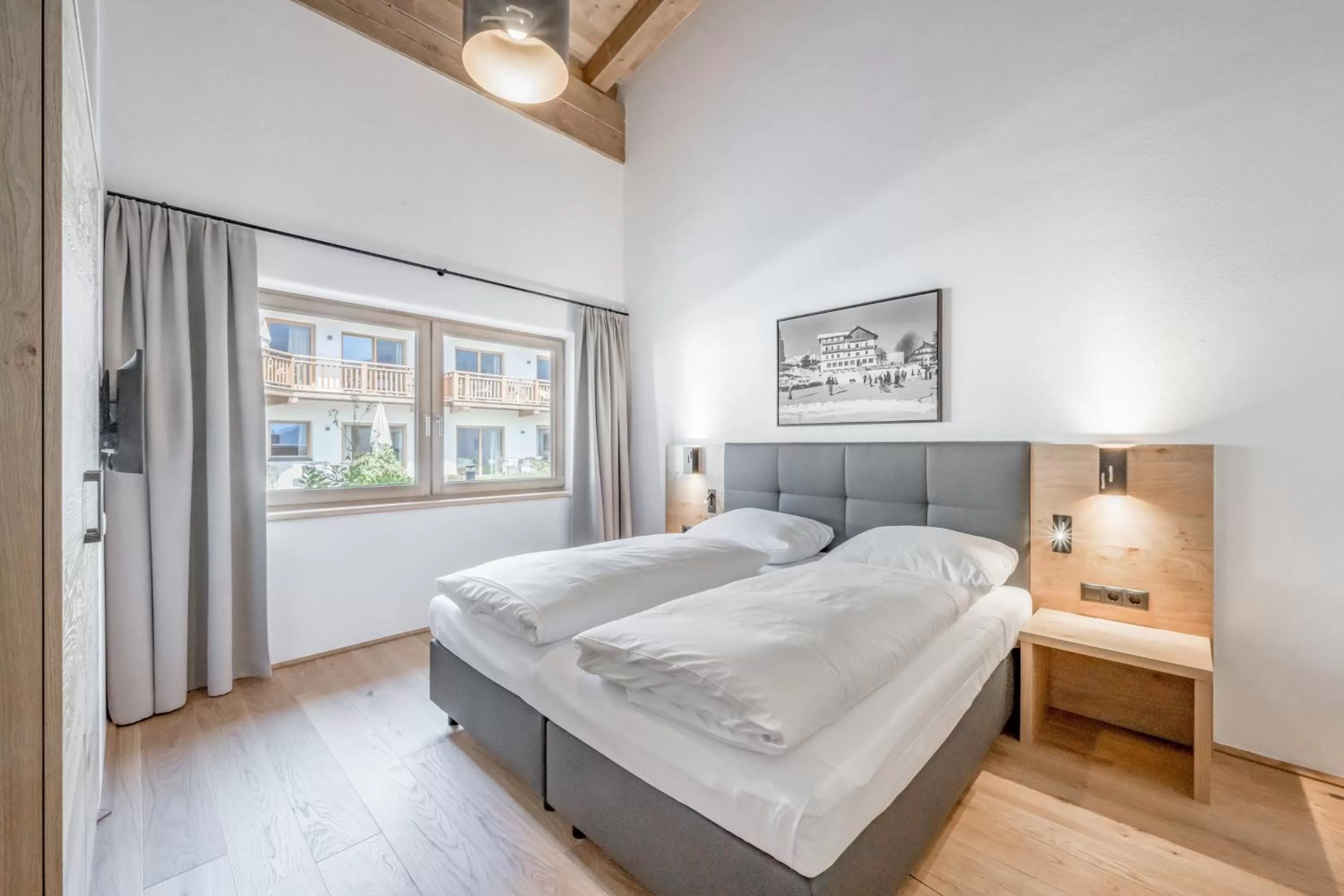 Bedroom, Bed in AlpenParks Chalet & Apartment Alpina Seefeld