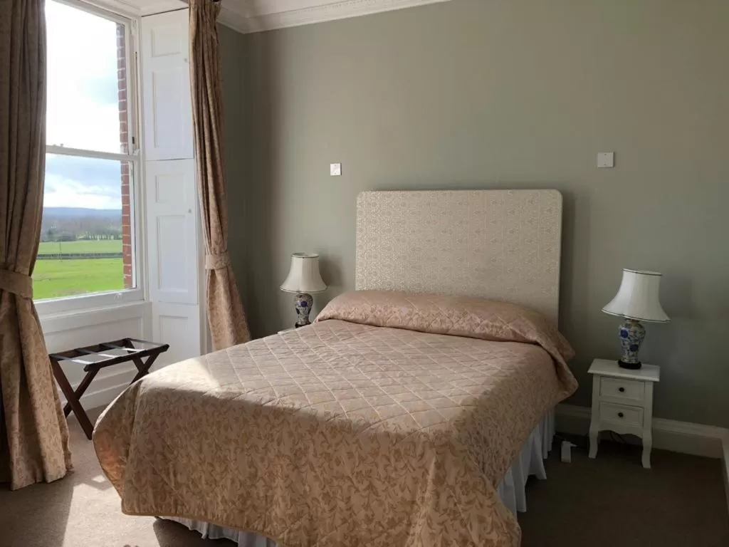 Bed in Longworth Hall Hotel