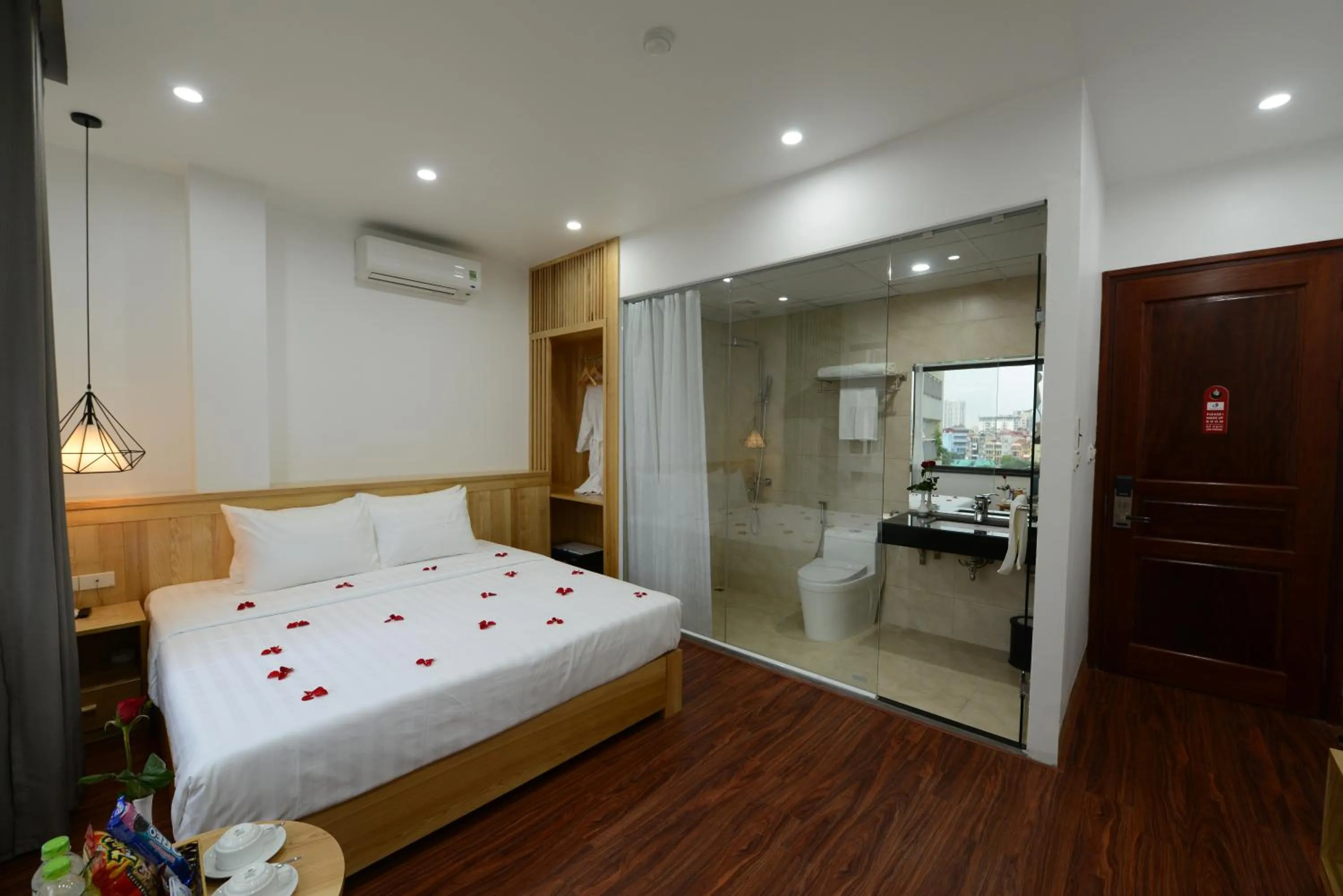 Bed in Blue Hanoi Inn City Hotel