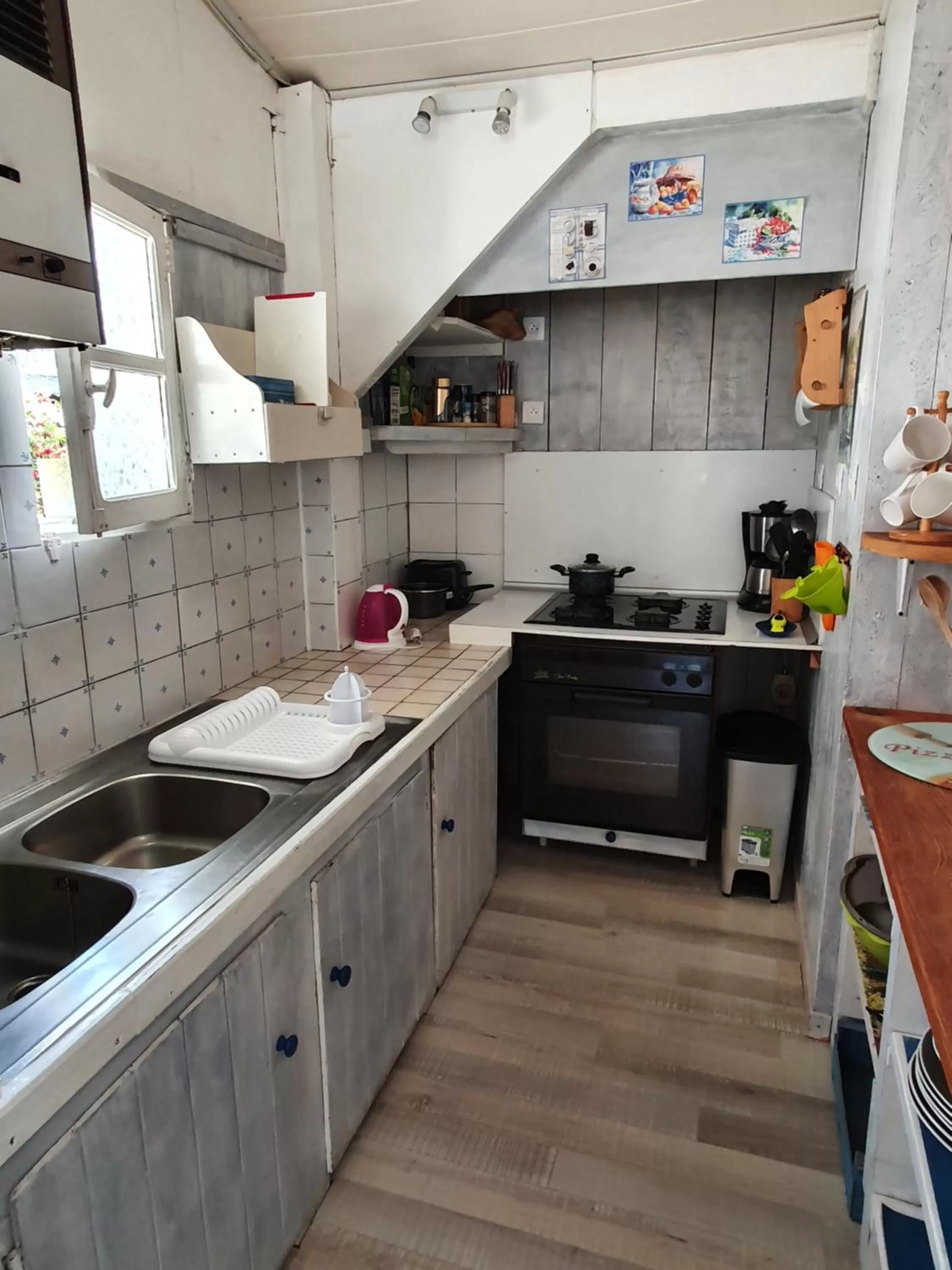 Kitchen or kitchenette in a2pasdelaforet