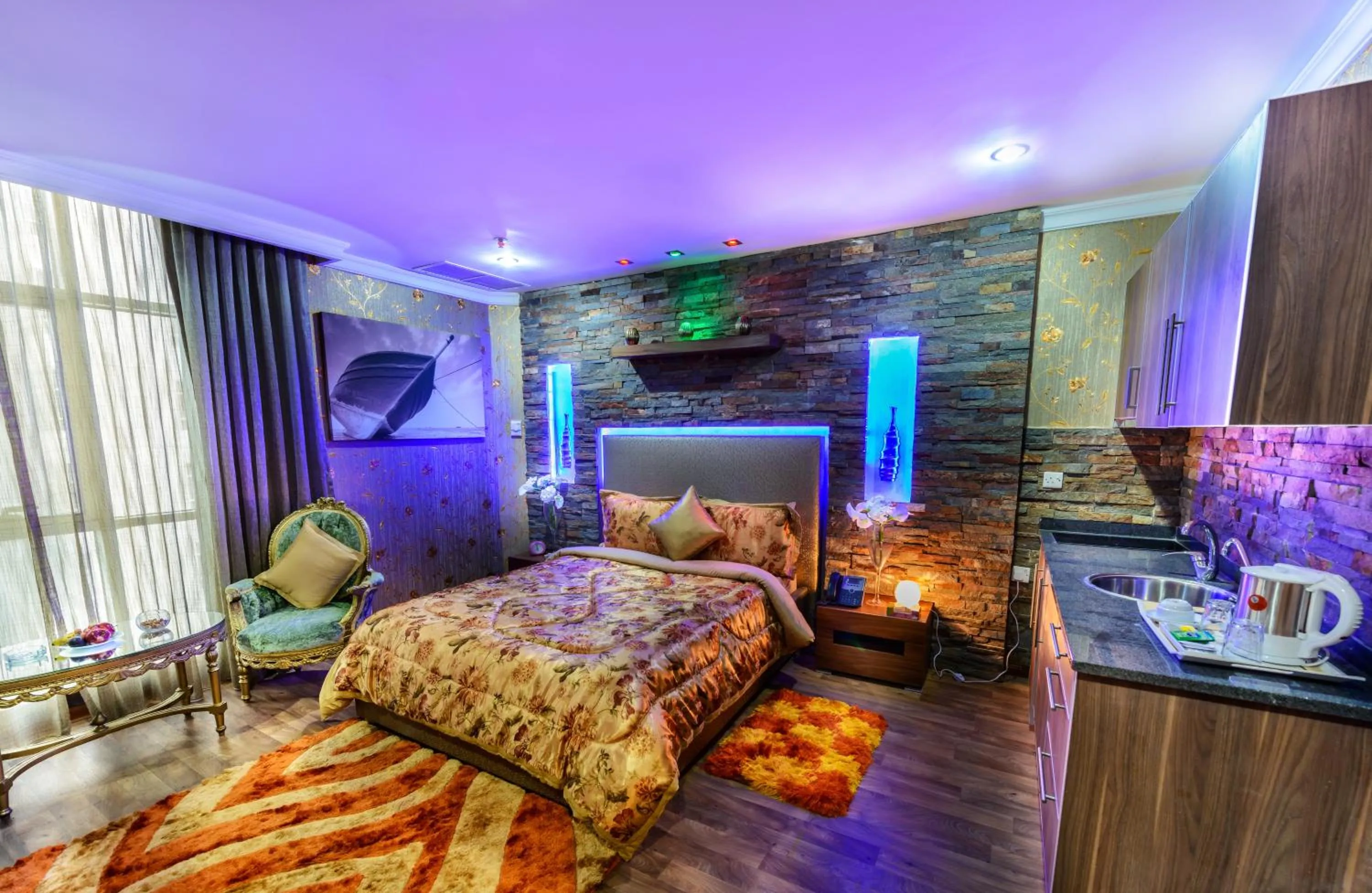 Bed in Bravo Royal Hotel Suites