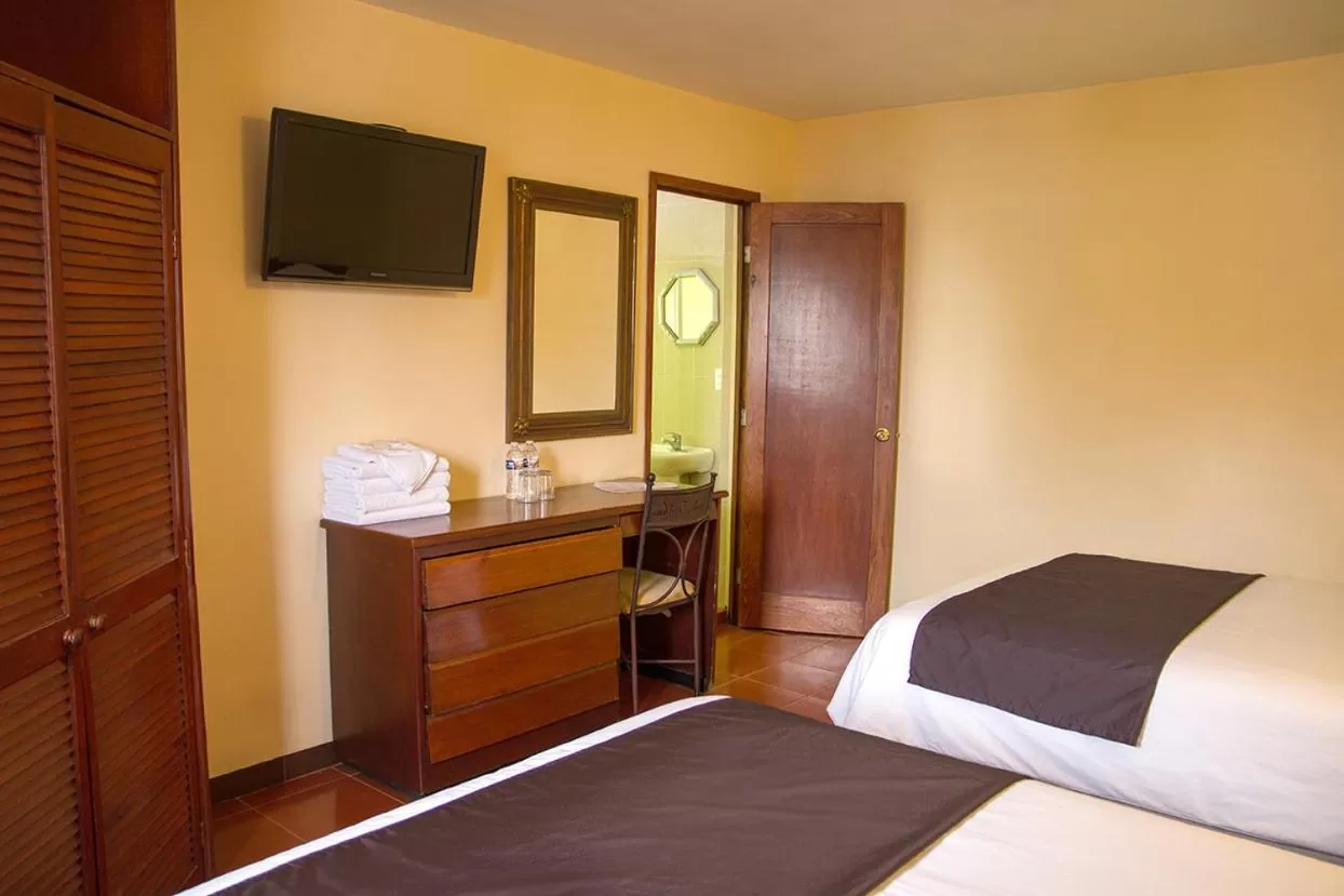 Bed in Hotel Posada Santa Bertha