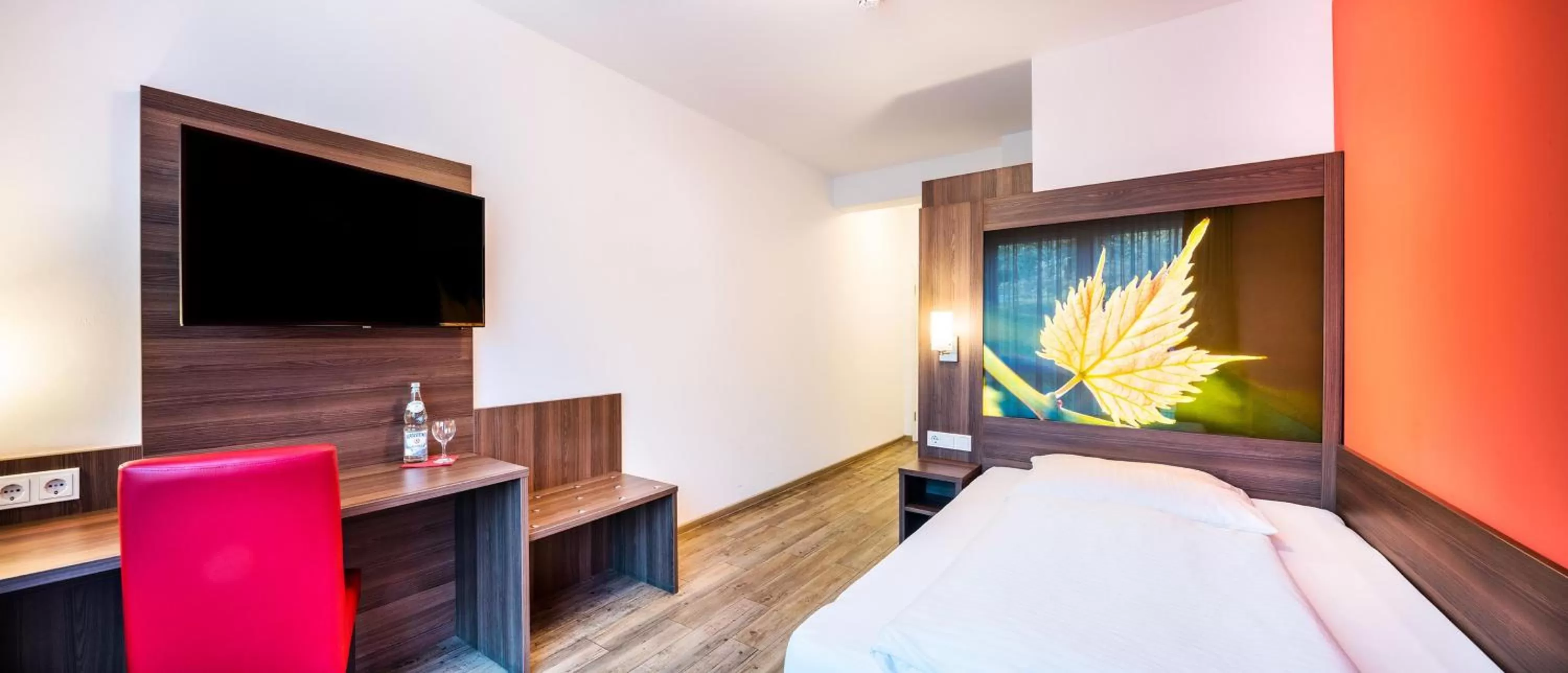 Bed in Schroeders Wein-Style-Hotel