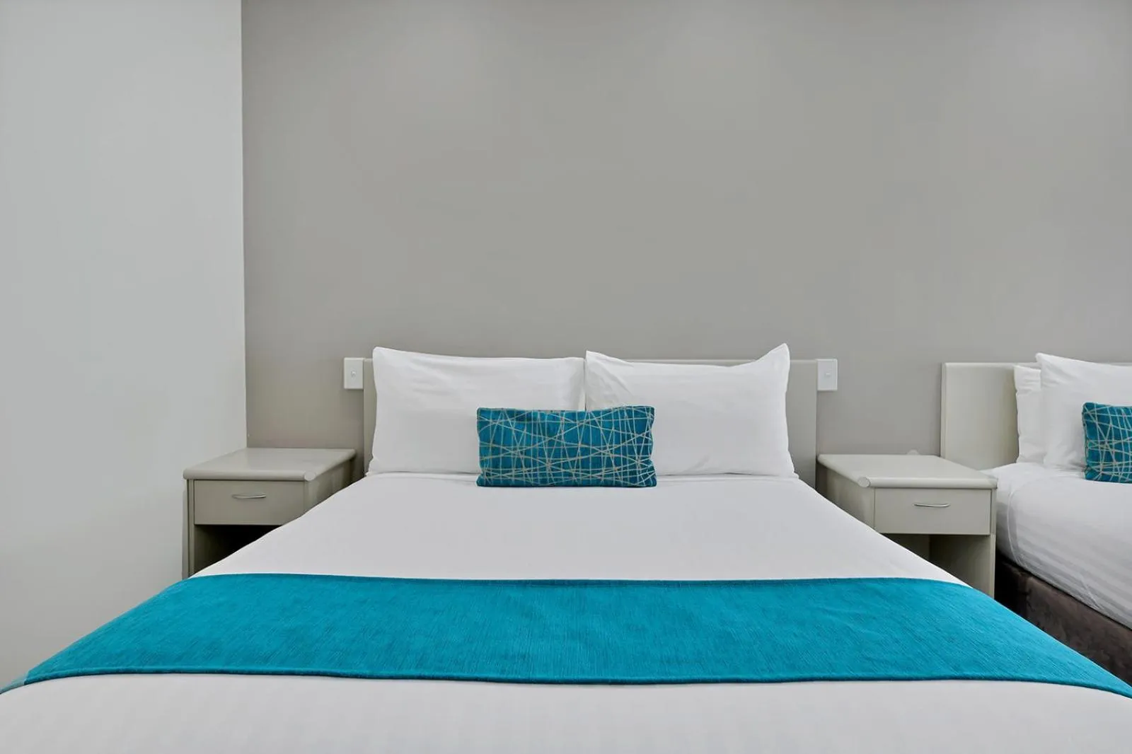 Bed in Central Caleula Motor Lodge