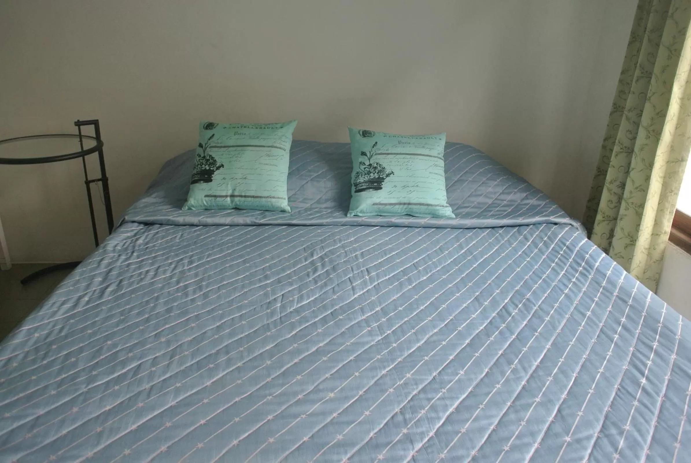 Bed in Oriental Smile Hotel