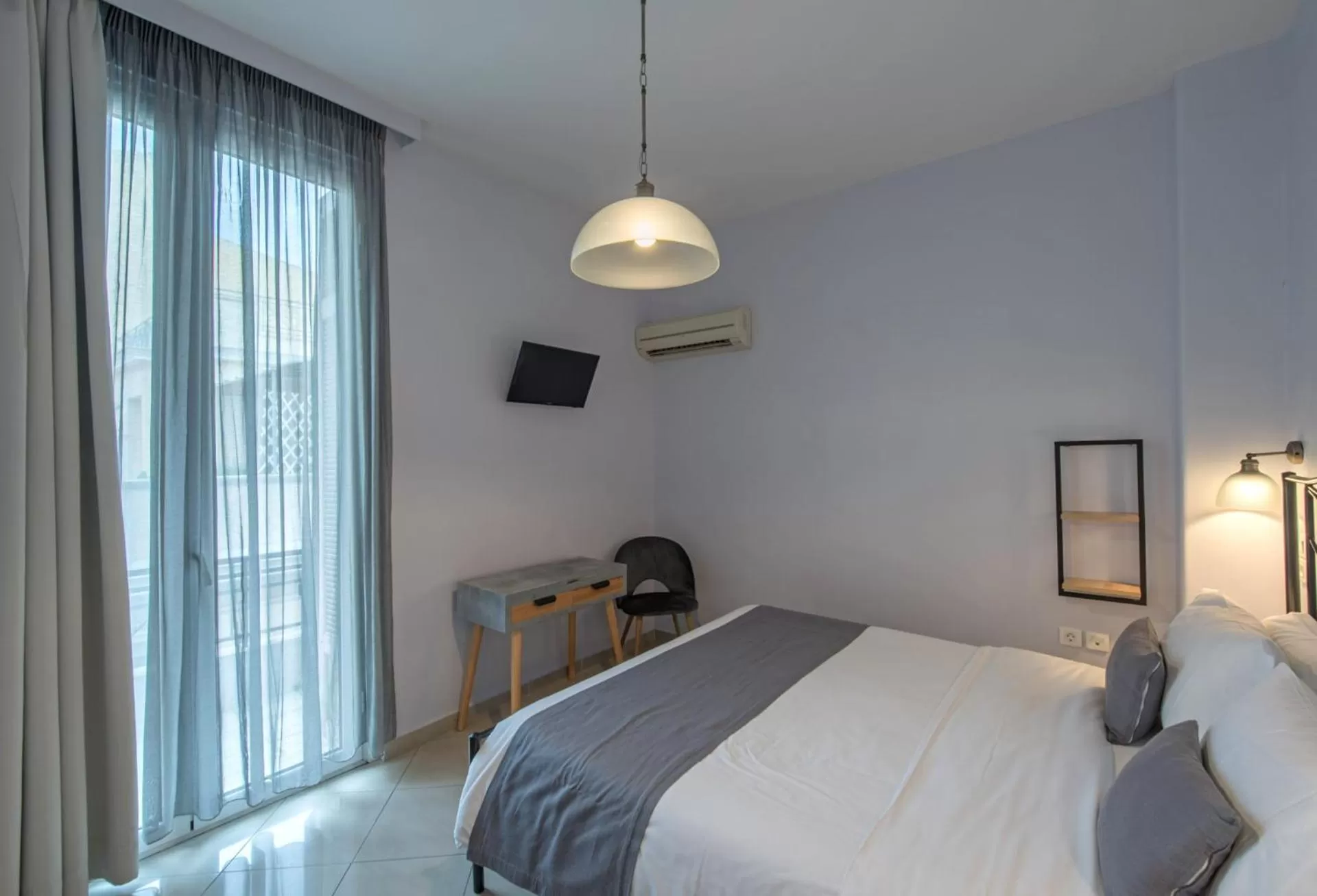 Bed in Kimon Hotel Athens