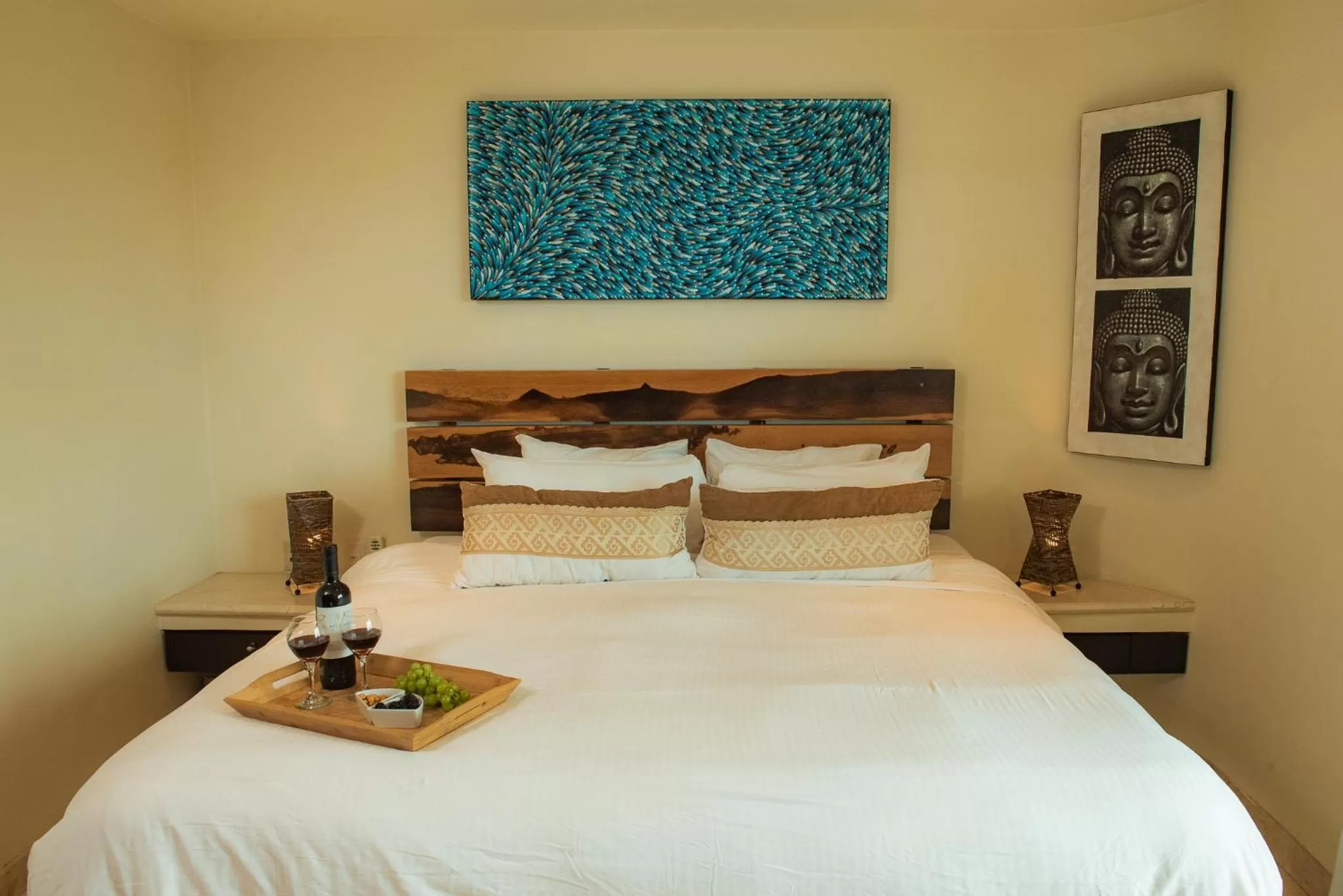 Bed in El Taj Oceanfront and Beachside Condo Hotel