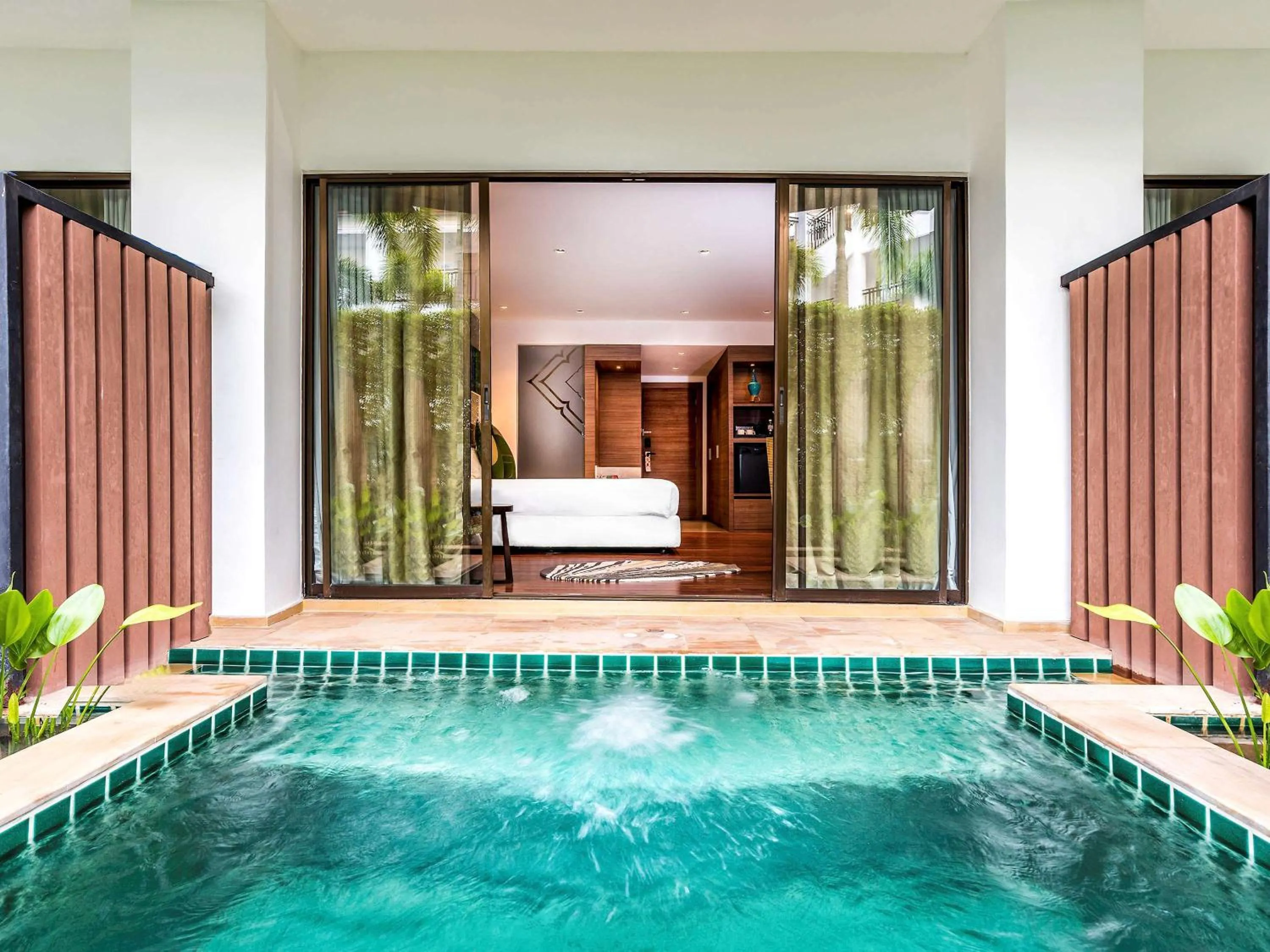 Photo of the whole room, Swimming Pool in Destination Resorts Phuket Karon Beach - SHA Extra Plus