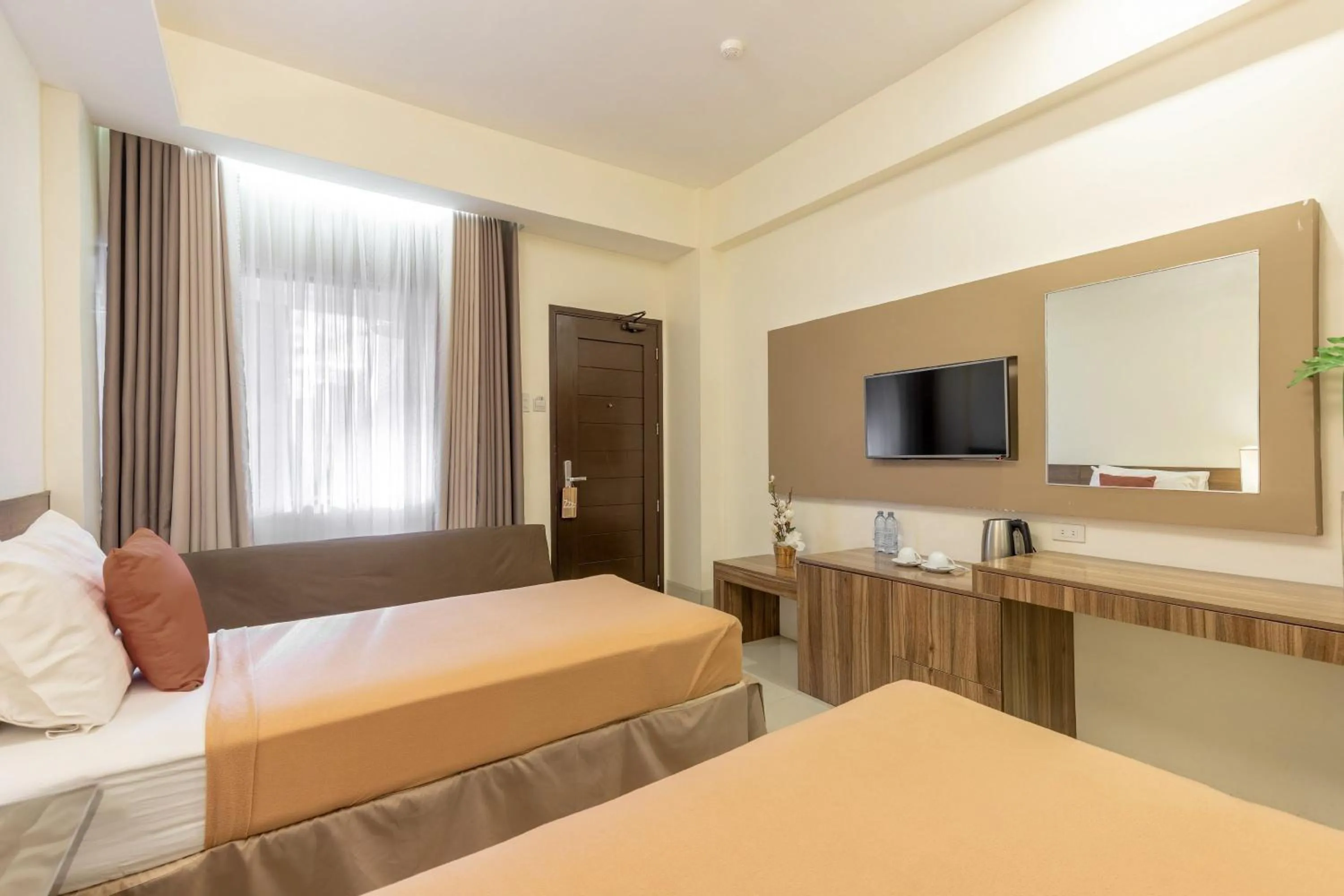 Bed in Selah Garden Hotel Manila