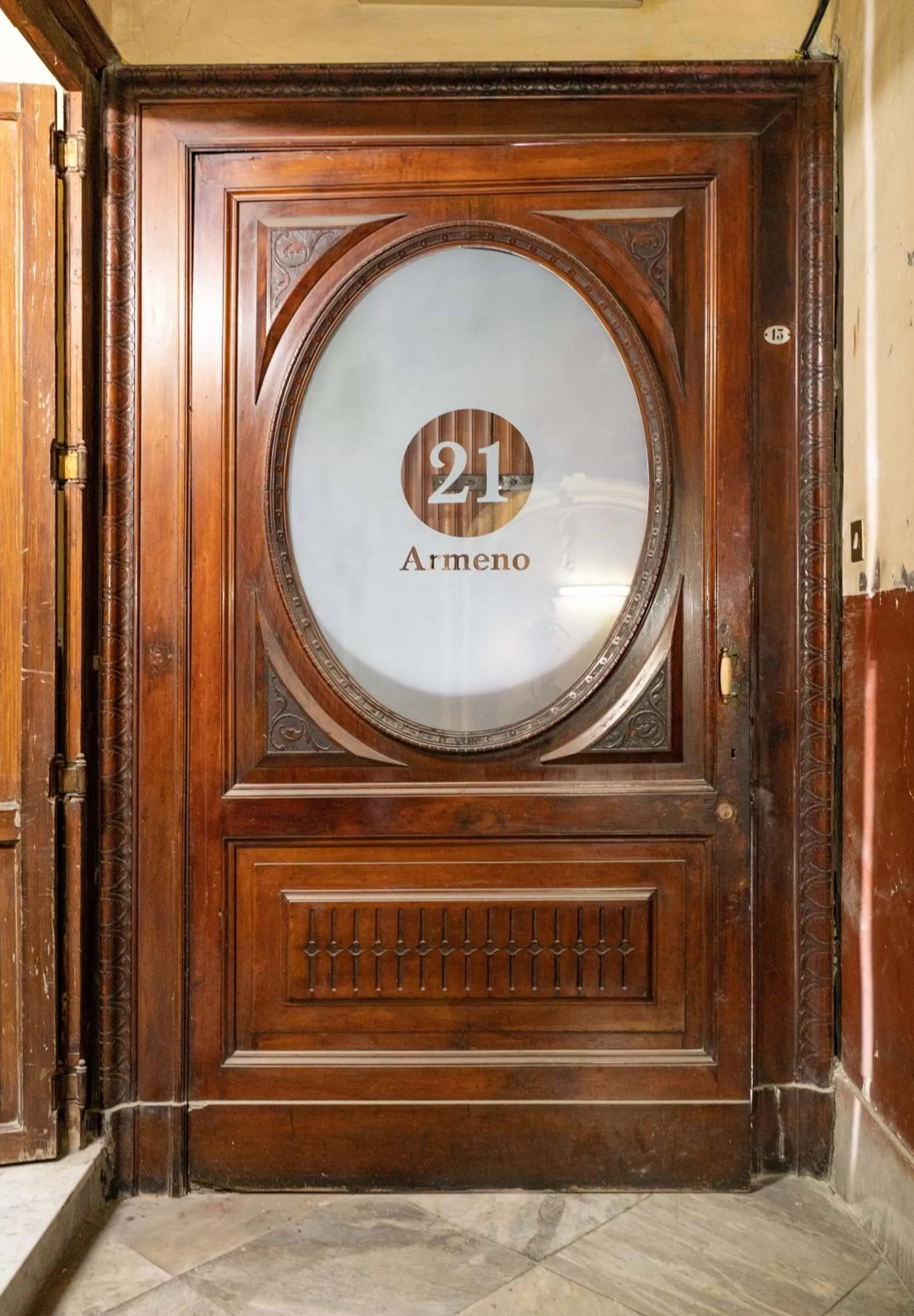 Property logo or sign in 21 Armeno