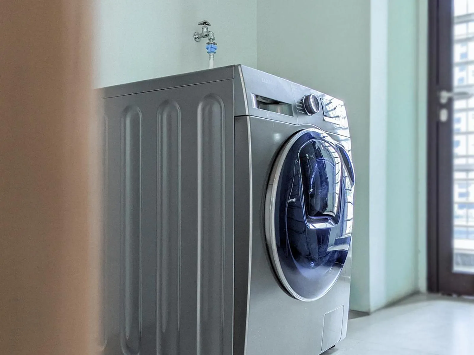 washing machine in Crowne Plaza Jakarta Residences, an IHG Hotel