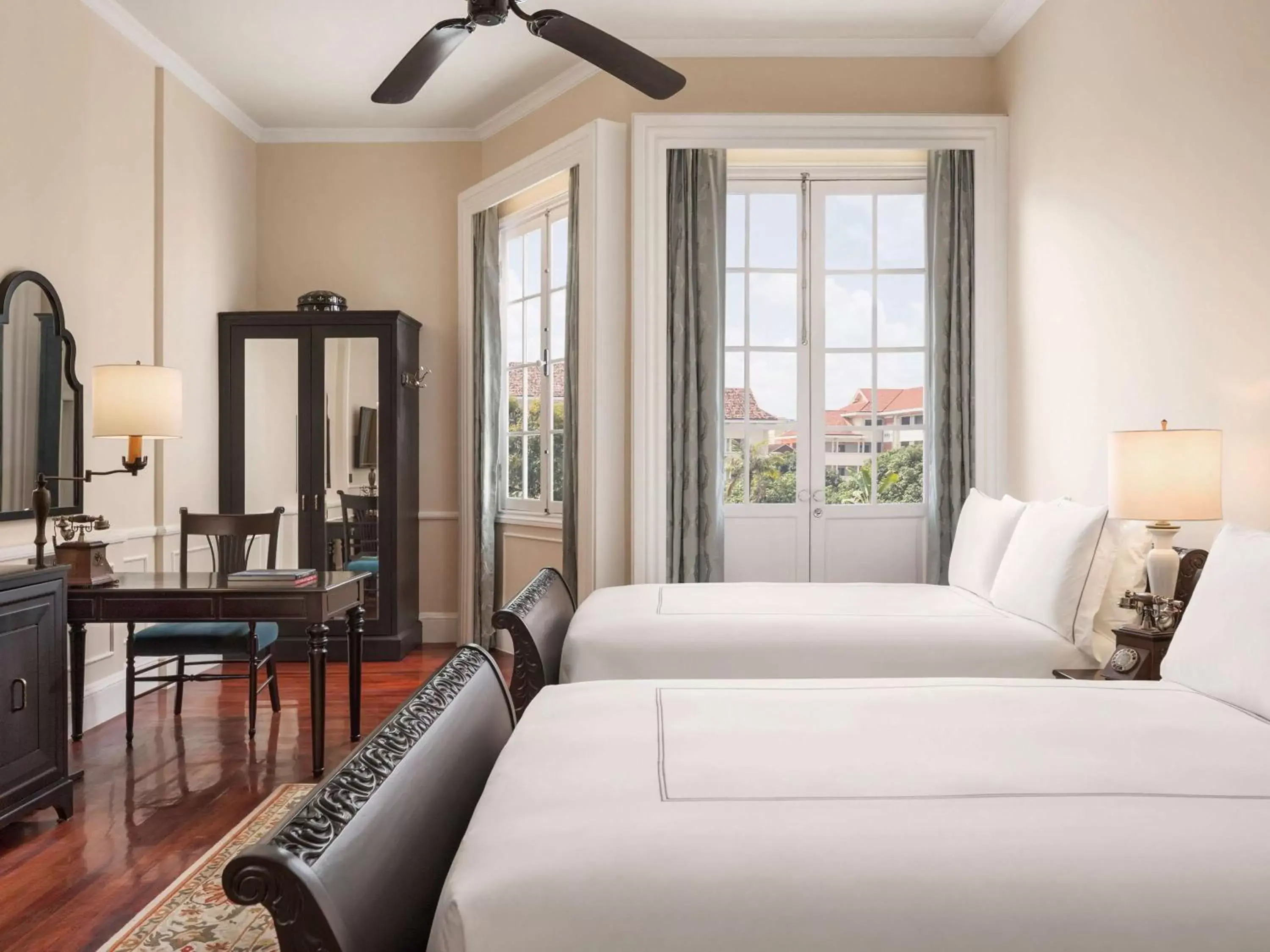 Landmark Suite with Terrace & Club Lounge Access -including Daily Breakfast, Evening Drinks & Canapes in Raffles Hotel Le Royal Landmark Suite with Terrace & Club Lounge Access -including Daily Breakfast, Evening Drinks & Canapes in Raffles Hotel Le Royal