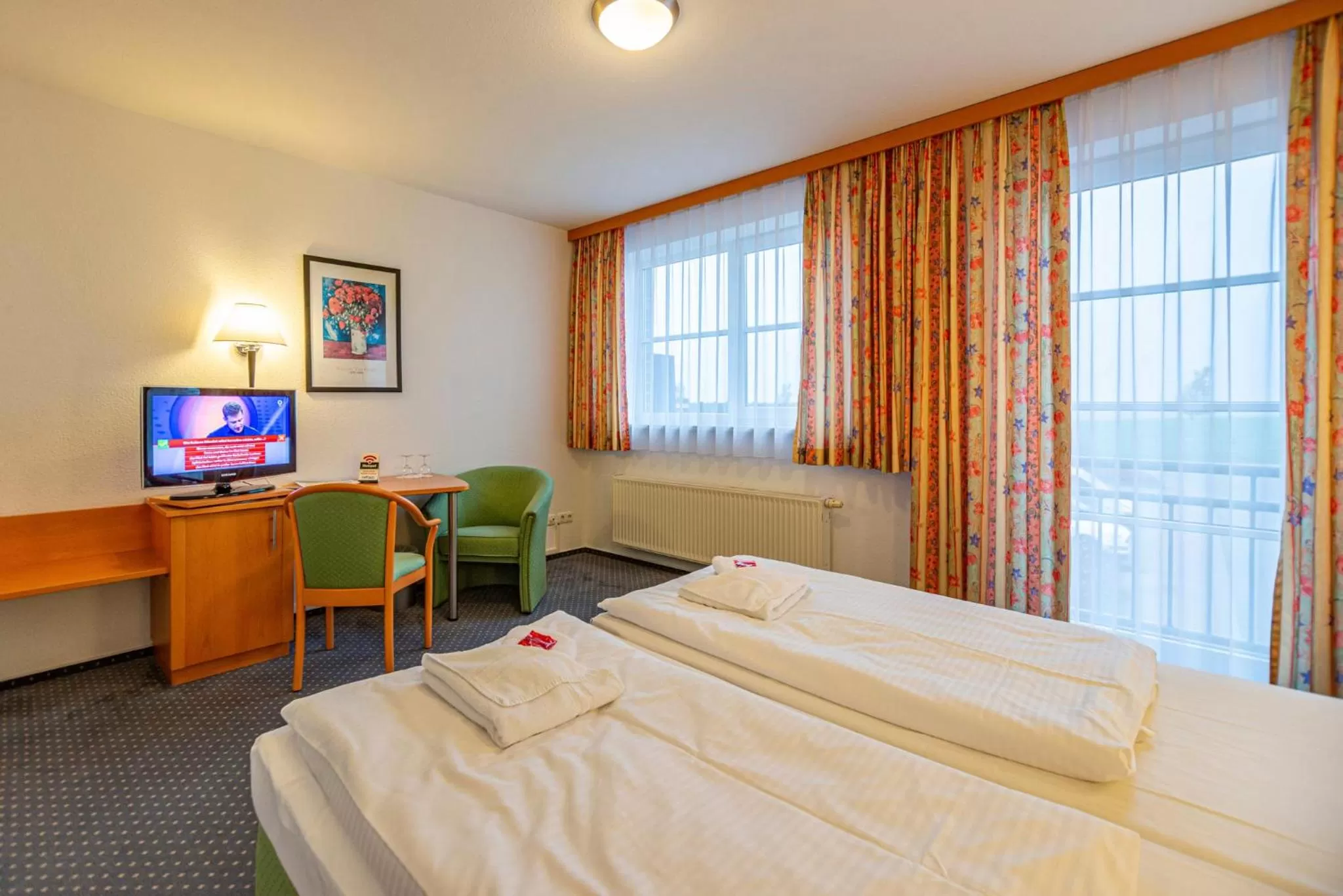 Photo of the whole room, Bed in Hotel Rostock West im "Kritzmow Park"