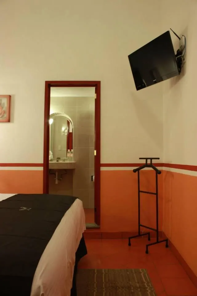 Toilet, Bed in Hotel de la Paz