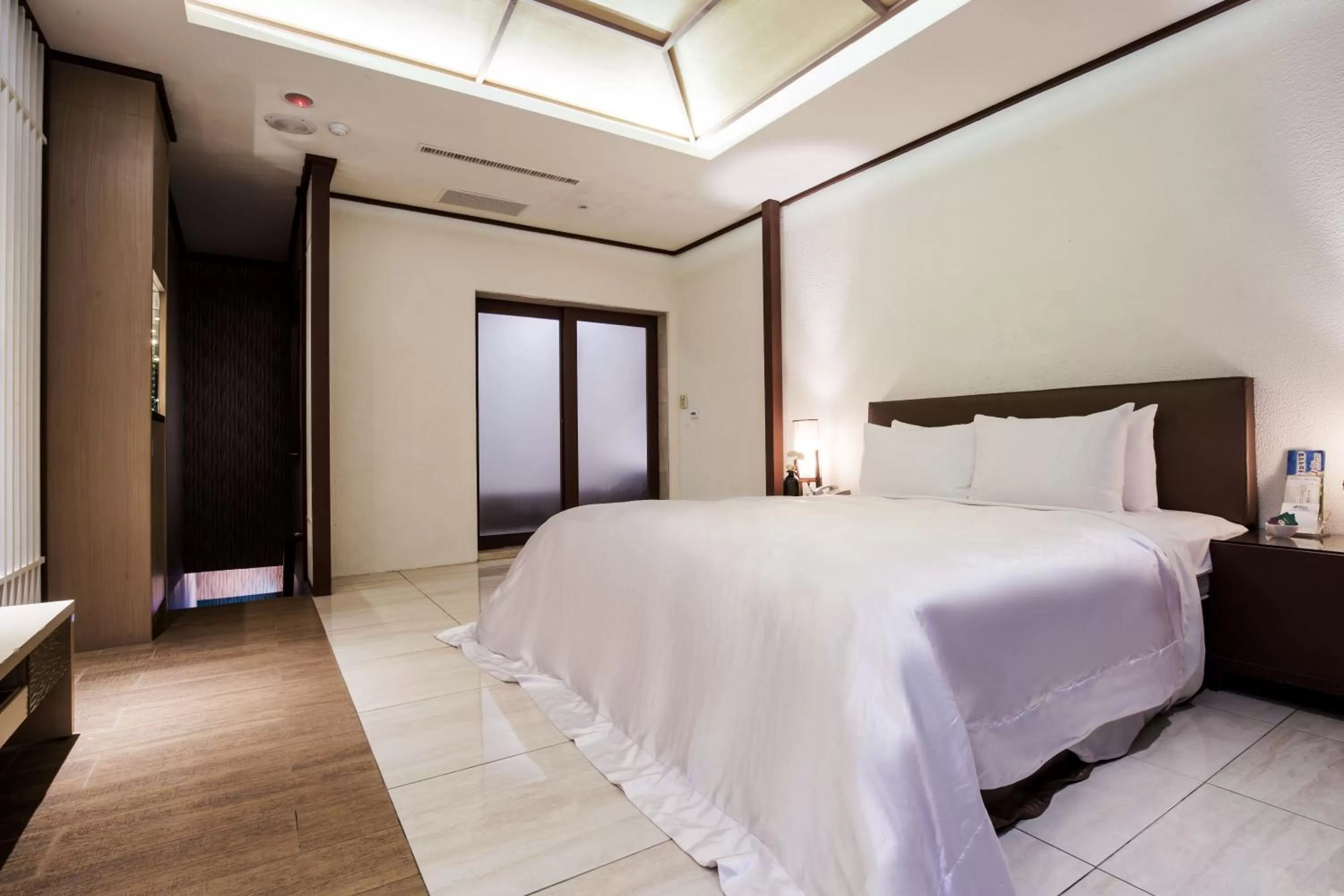 Bed in Duo Romance Hotel