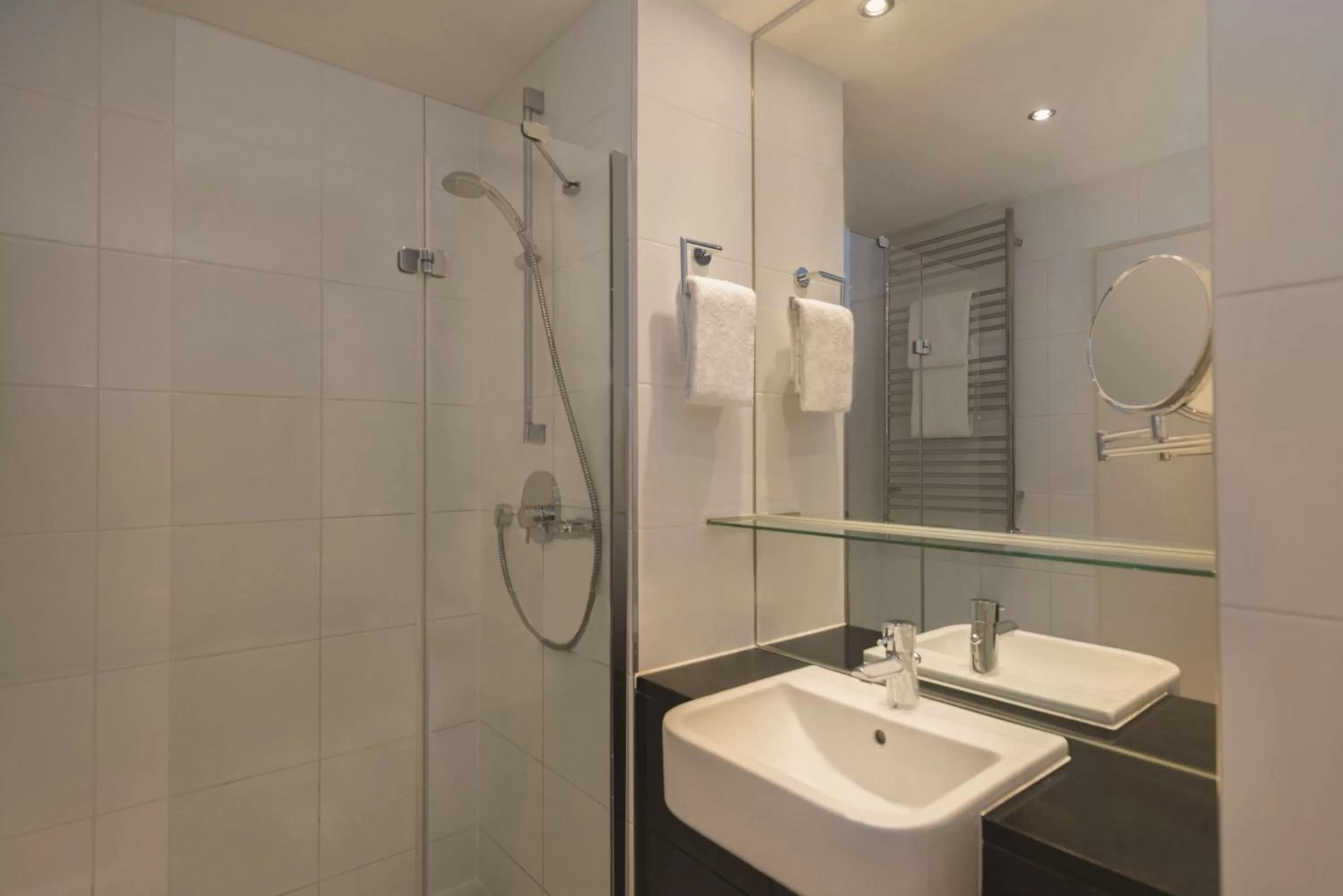 Bathroom in Adina Apartment Hotel Berlin Checkpoint Charlie