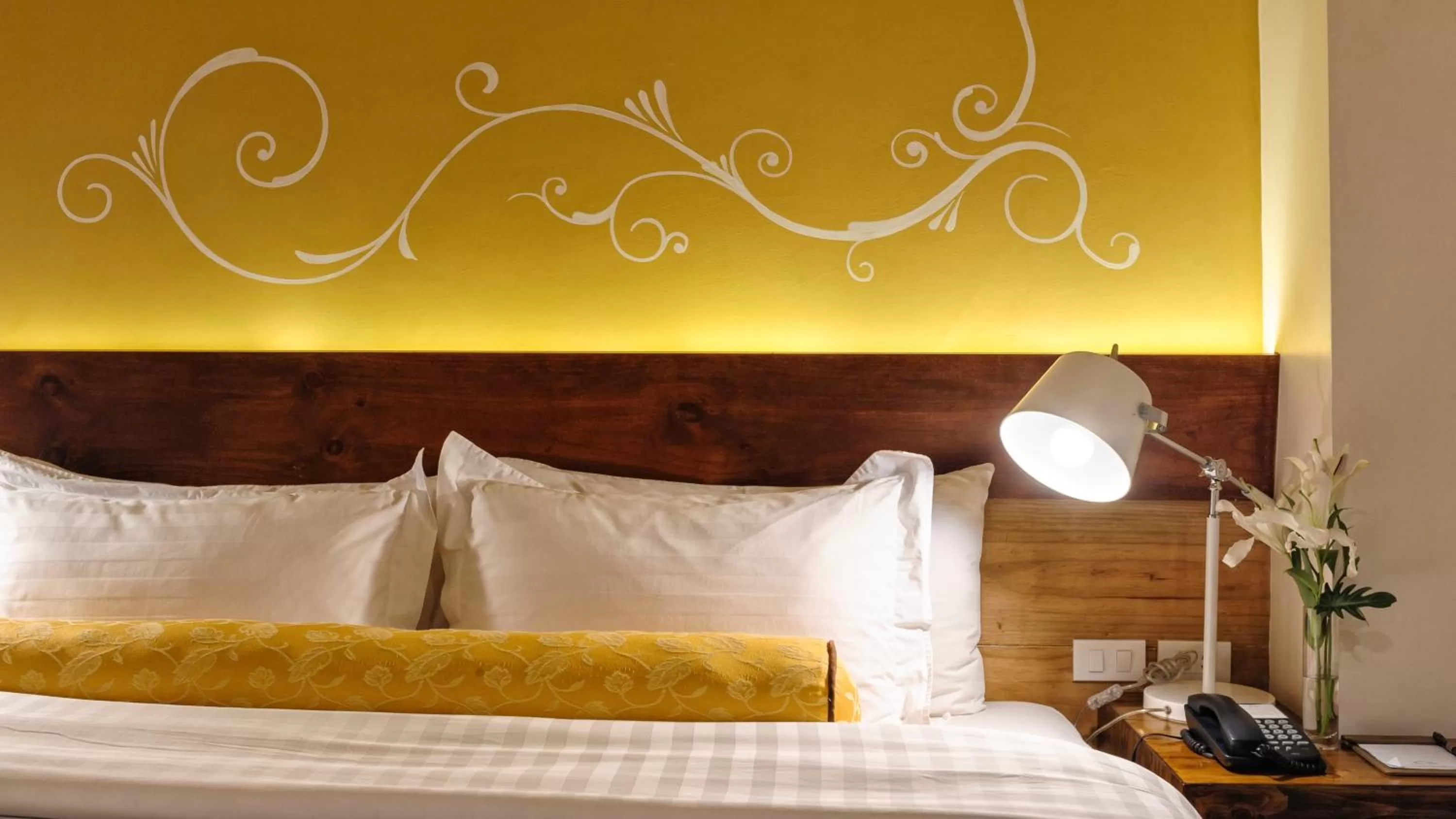 Bed in Sweet Home Boutique Hotel