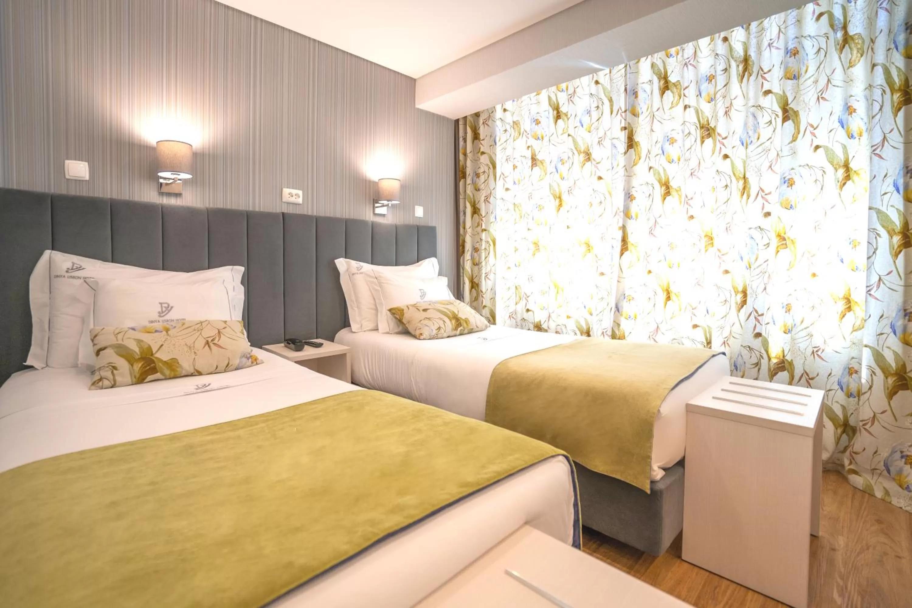 Bed in Dinya Lisbon Hotel