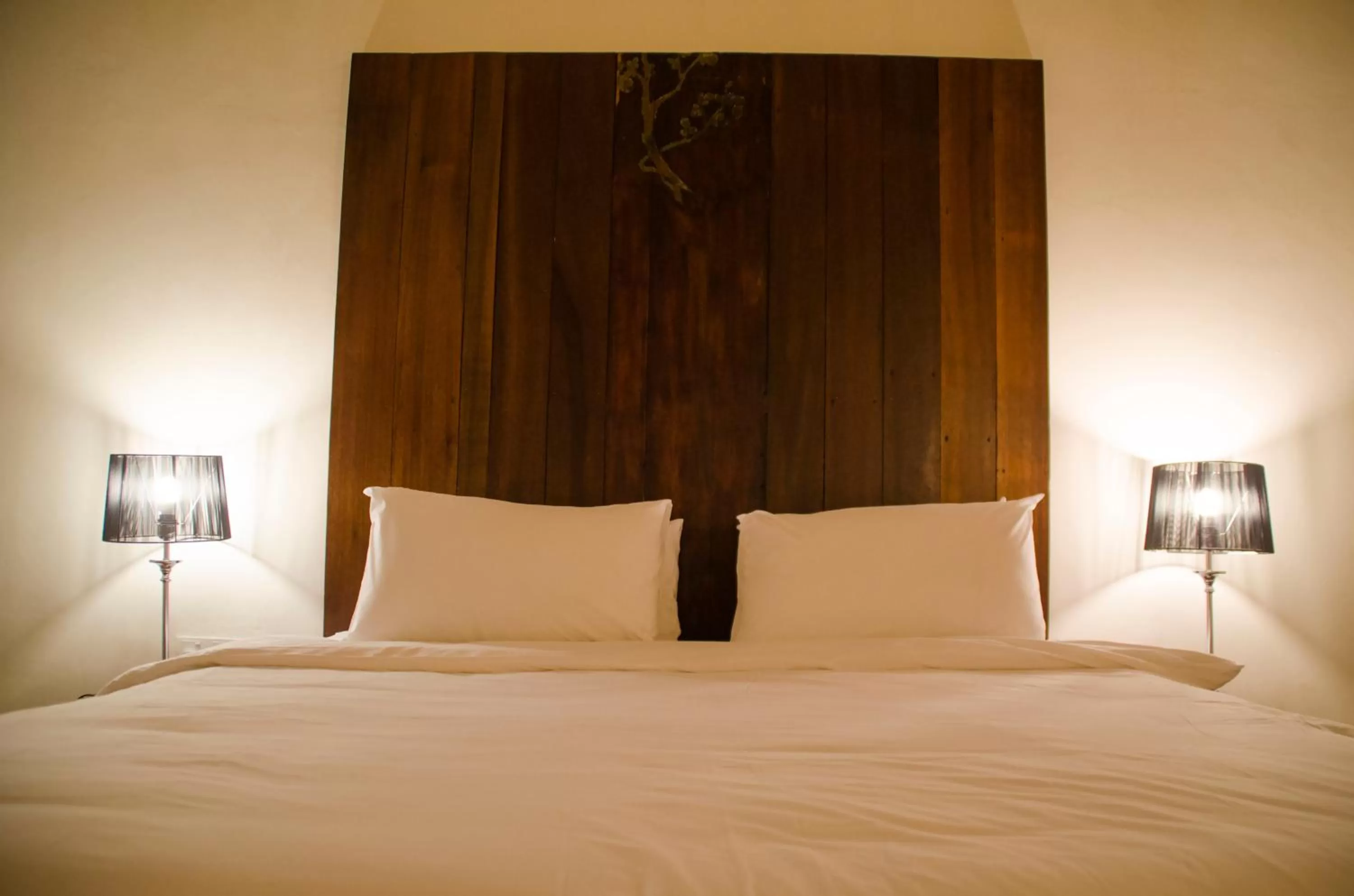 Bed in Ren I Tang Heritage Inn