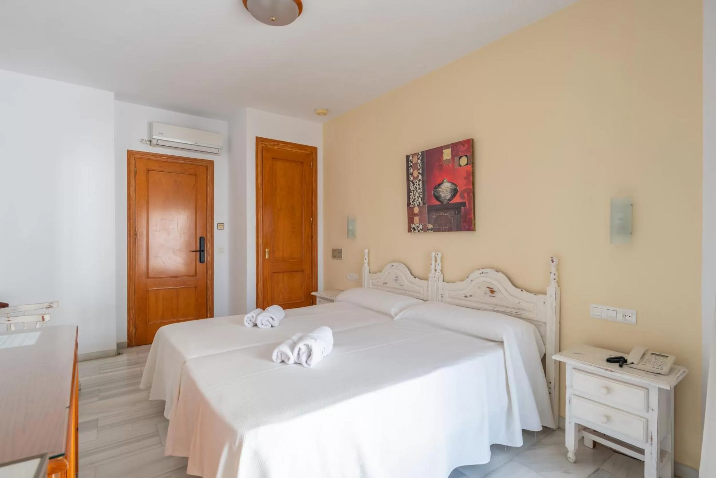 Bed in Apartahotel Playamaro by Dorobe