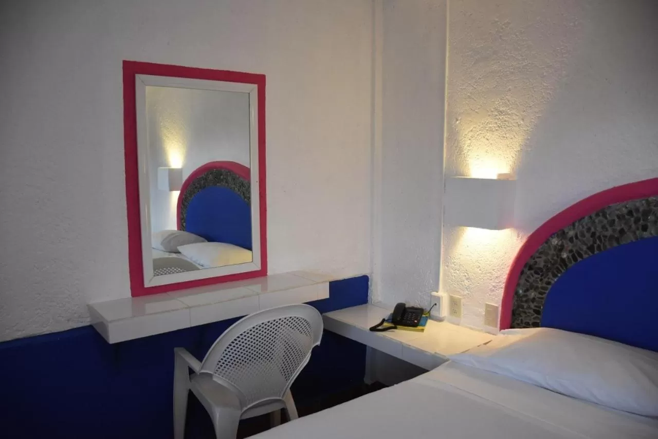 Bed in Hotel Pachuca Inn