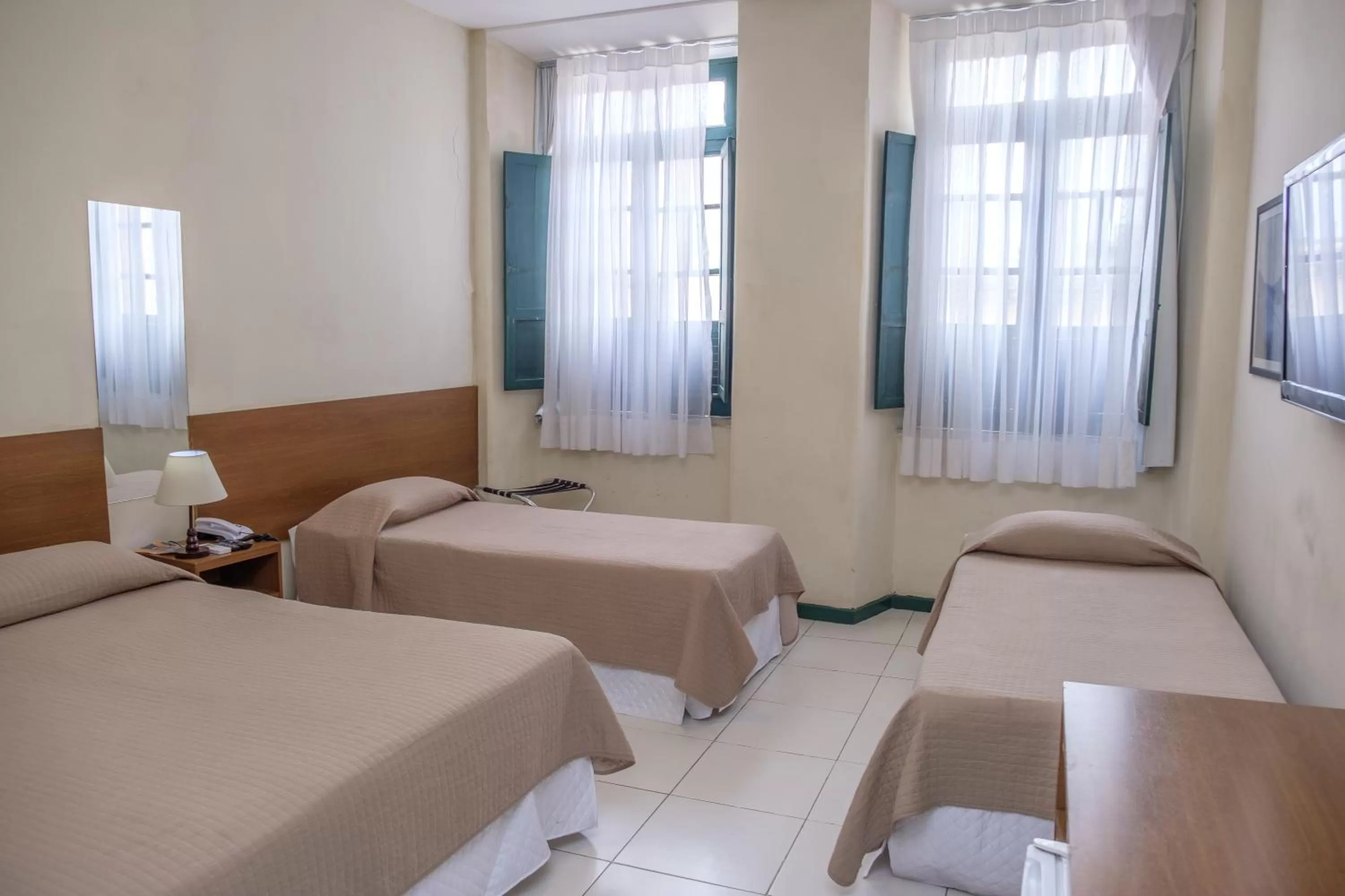 Bed in Pousada Colonial Chile