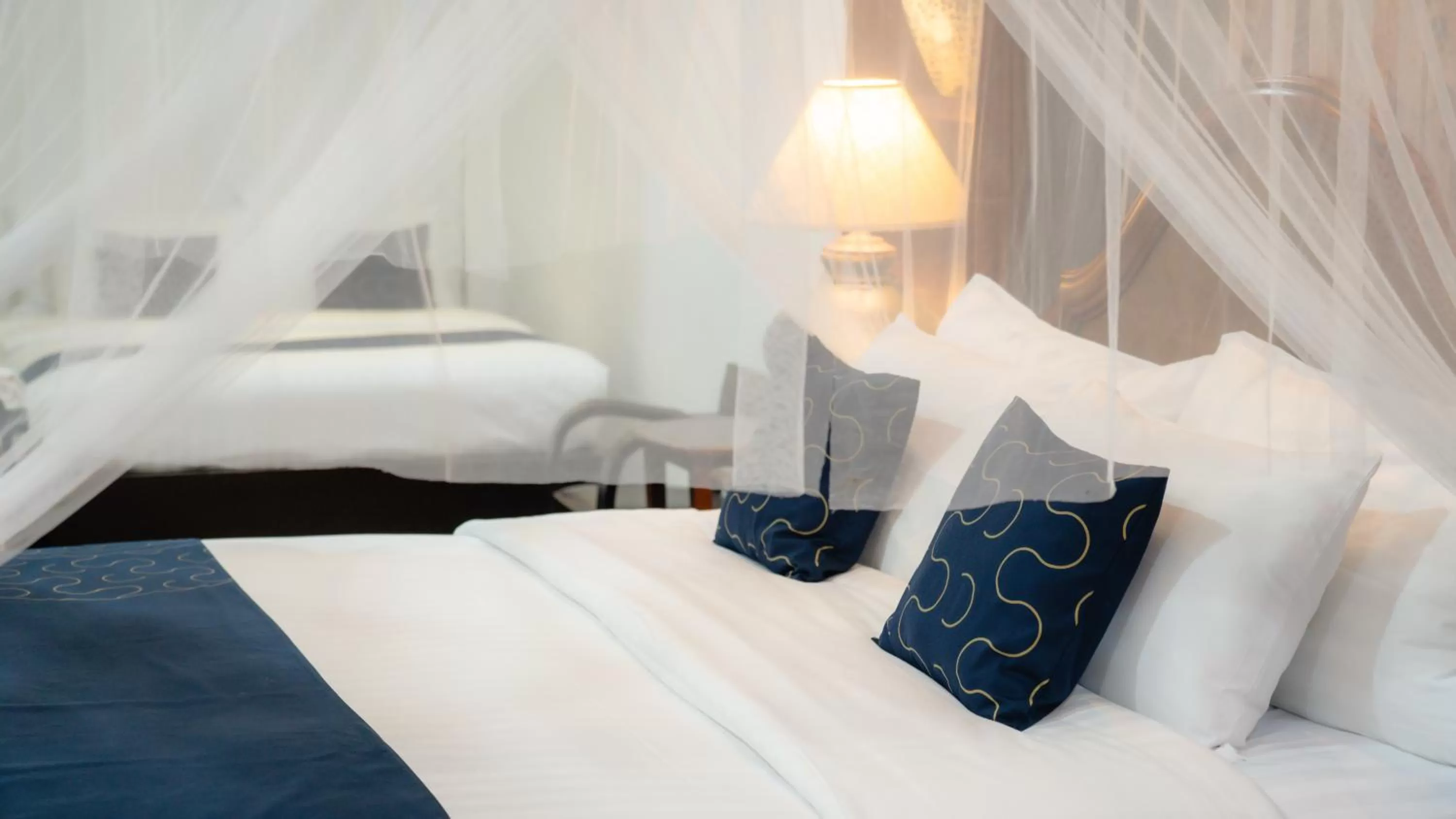 Bed in Cheva Gallery Boutique Hotel