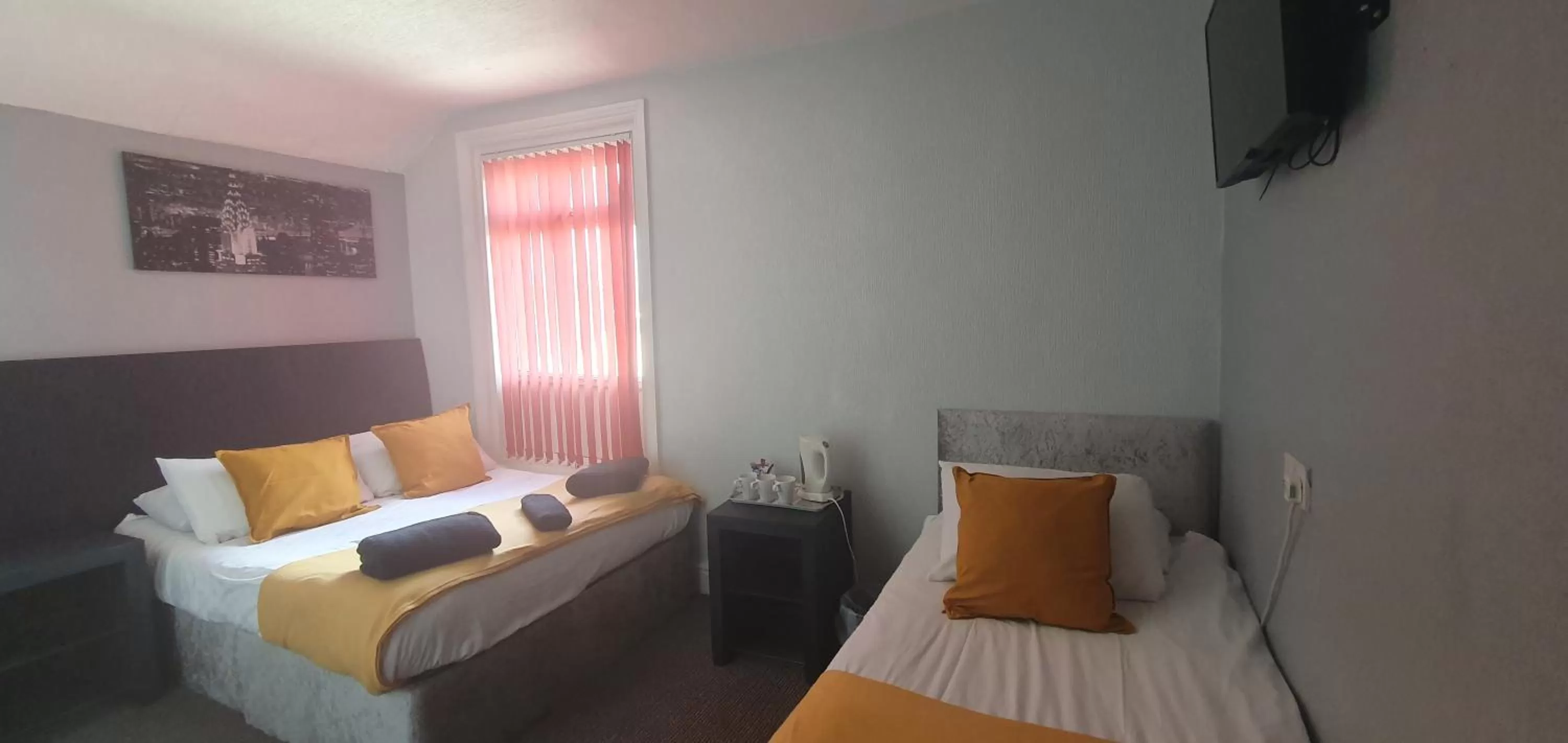 Bed in Palm Beach Hotel by the Sea