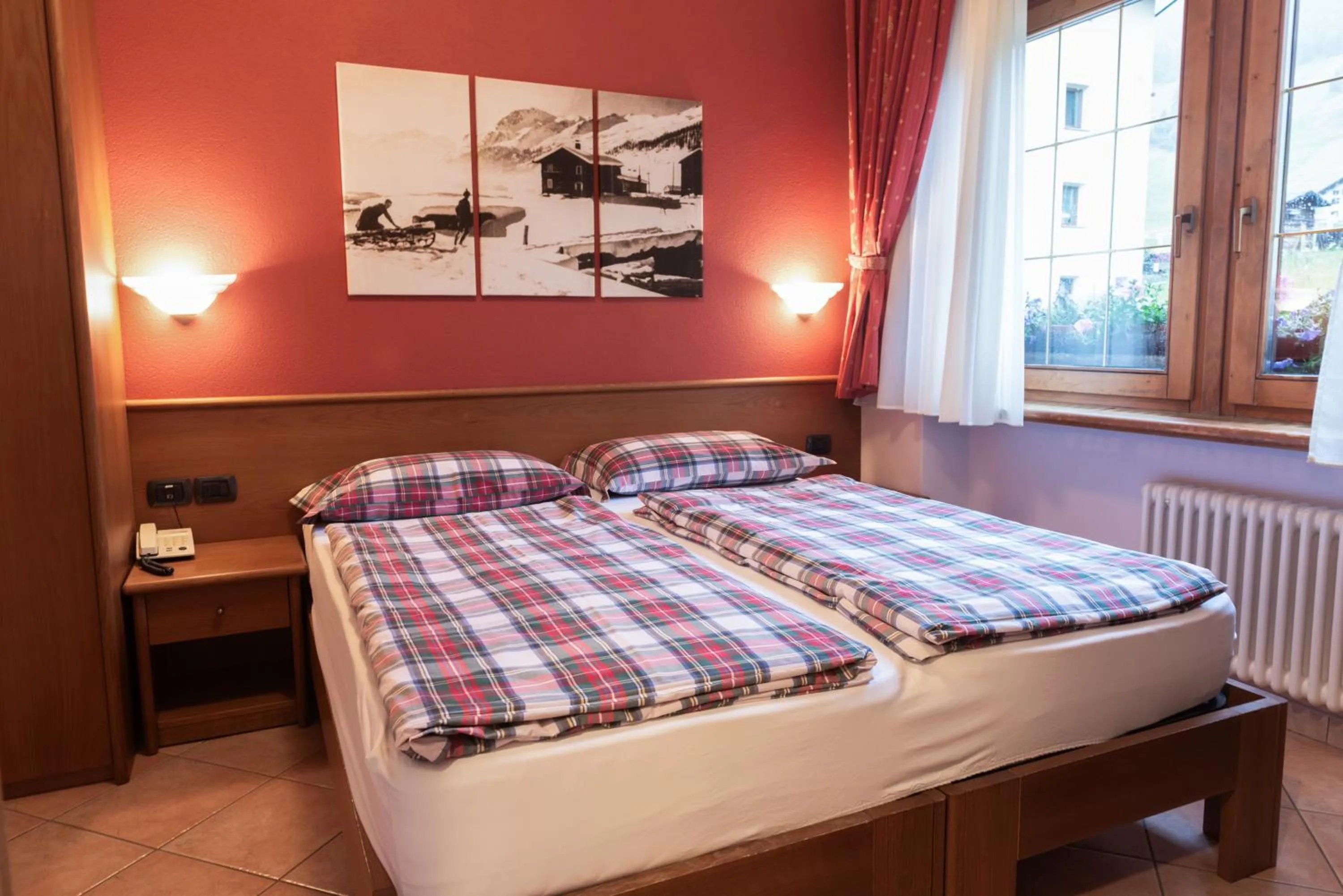 Bed in Hotel Garni Rin Da Rin