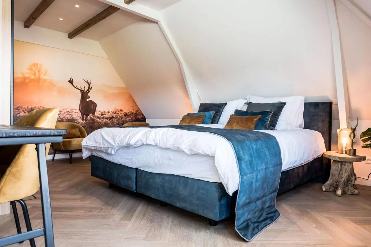 Photo of the whole room, Bed in de Vogelensangh