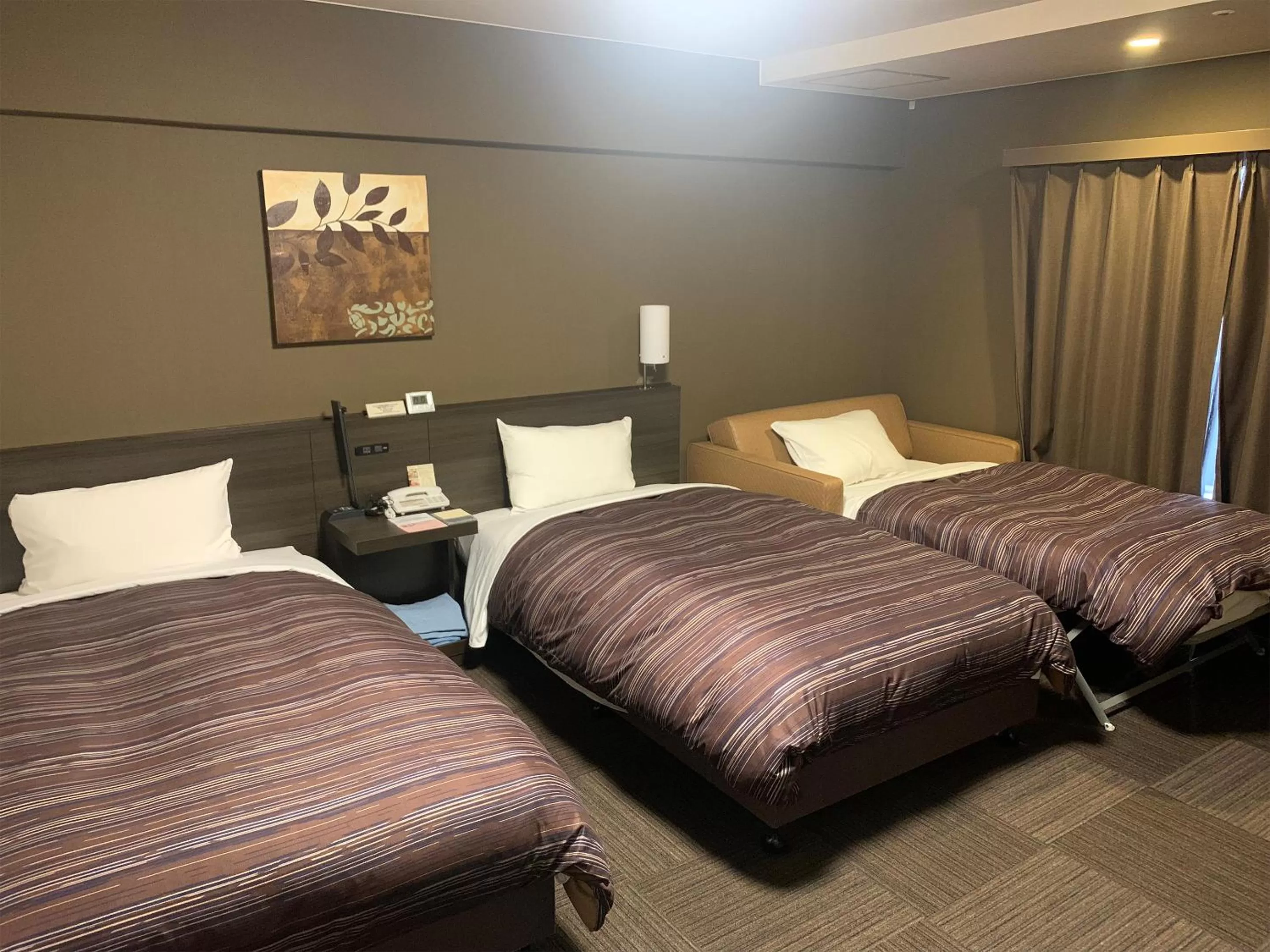 Photo of the whole room, Bed in Hotel Route-Inn Kumamoto Ekimae