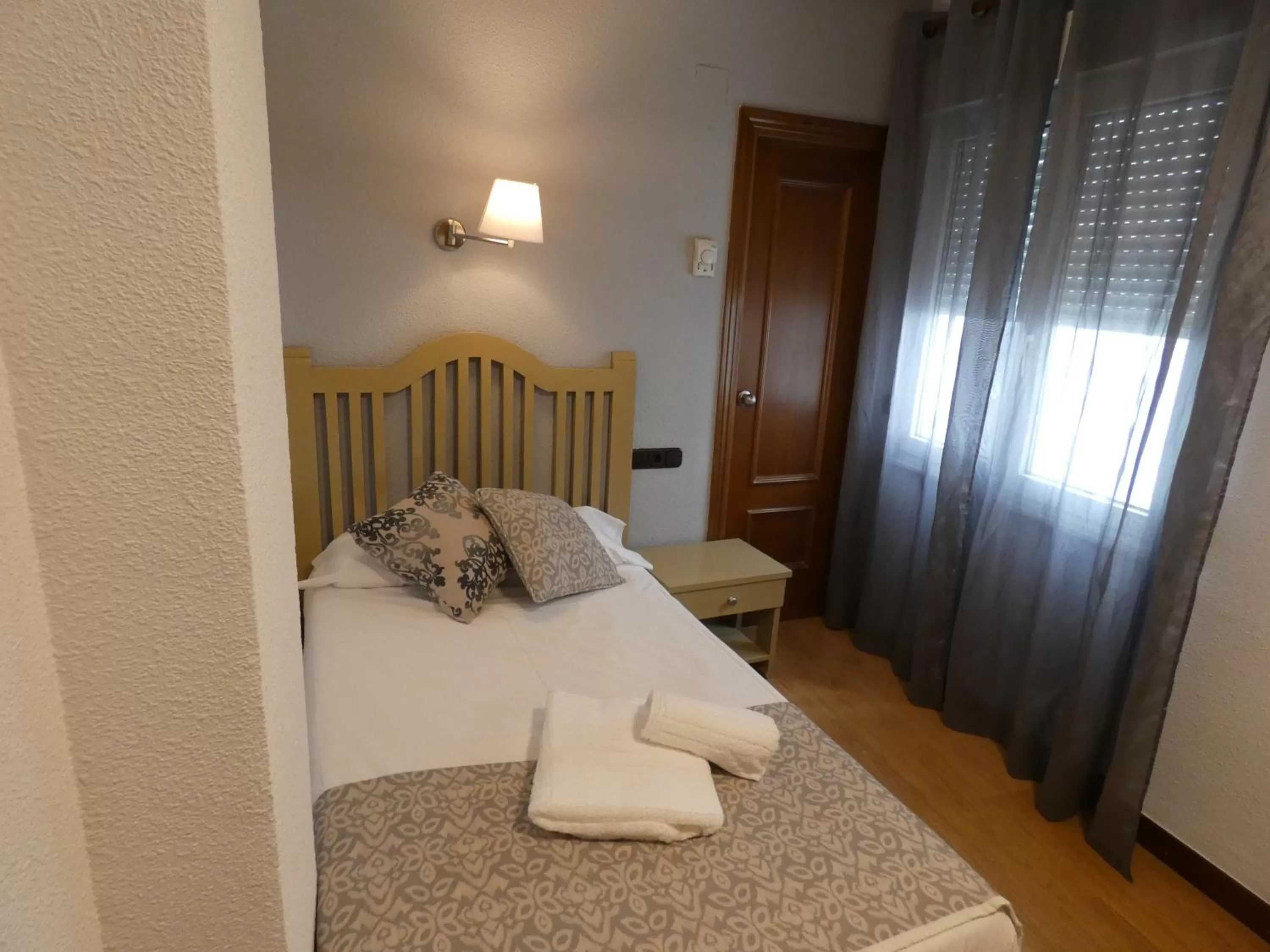 Bed in Hotel Mercado by gaiarooms