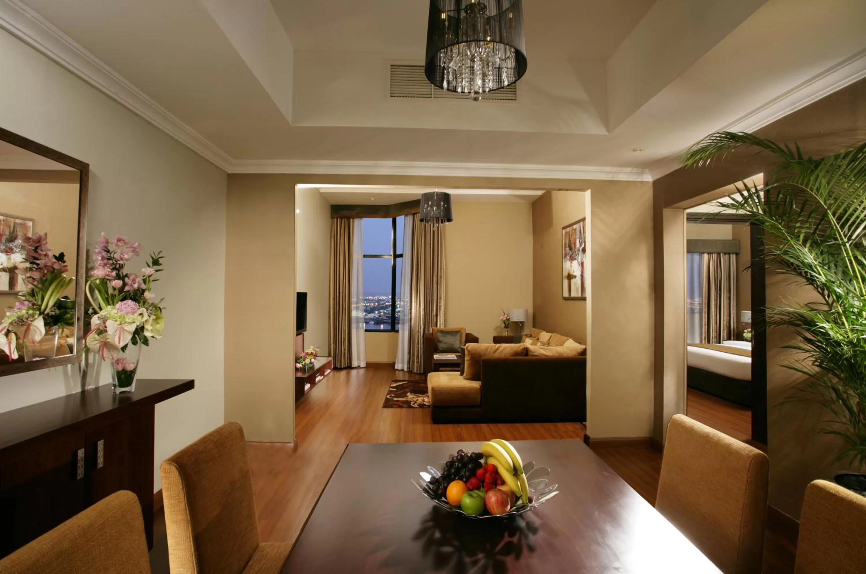 Living room, Bed in Ramada Hotel & Suites by Wyndham Ajman
