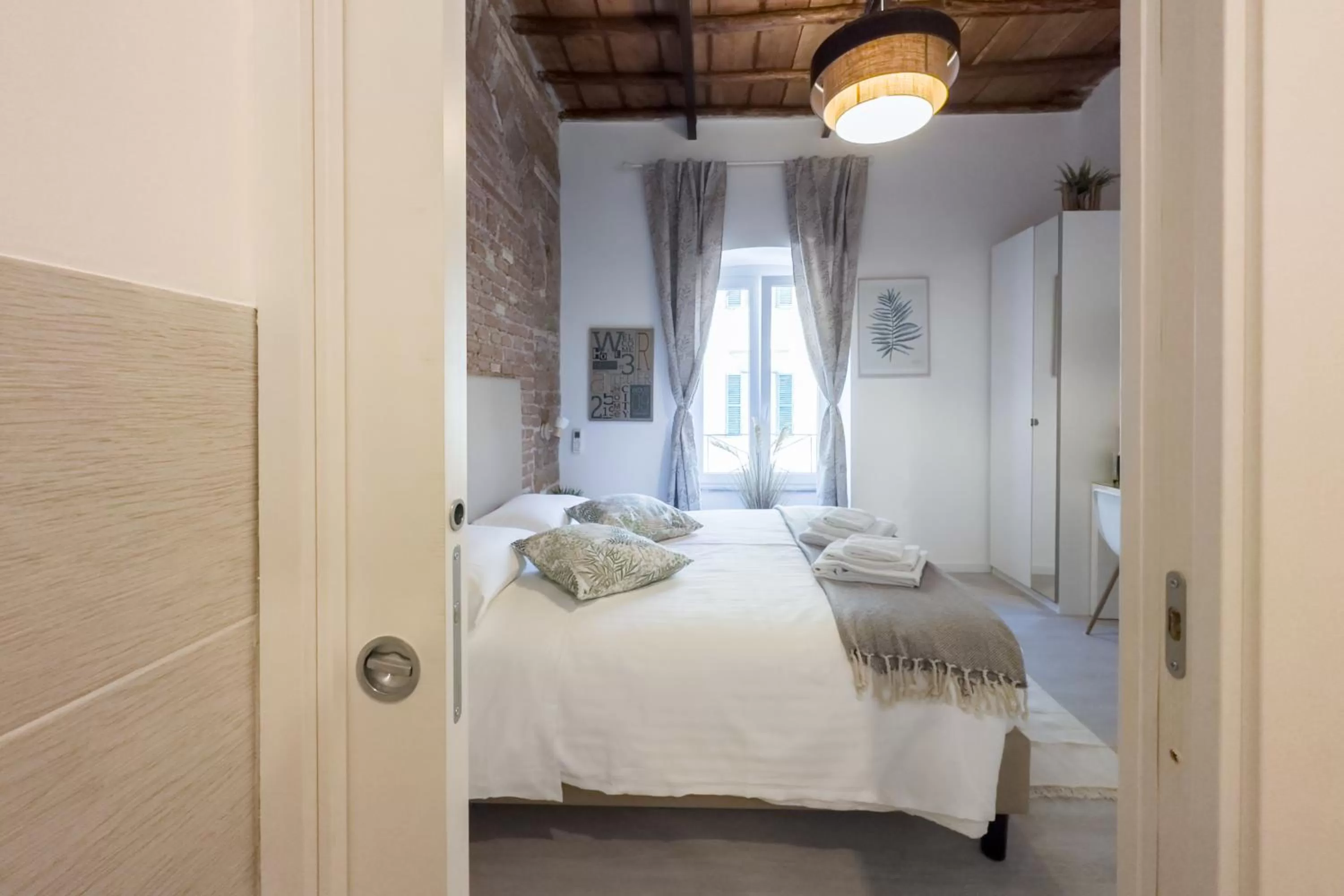 Bed in White Ostilia B&B