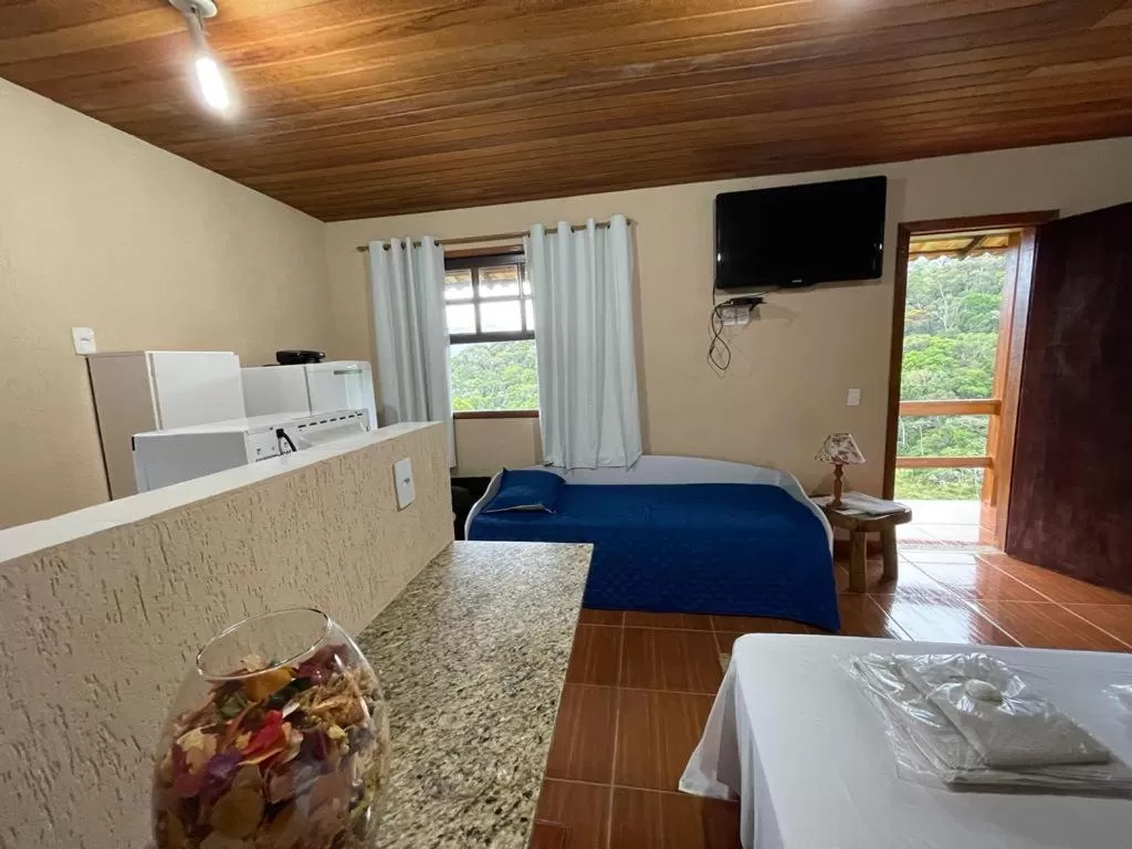 Bed in Pousada R.N.C. Nosso Paraíso