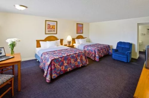 Bed in Howard Johnson by Wyndham Raton