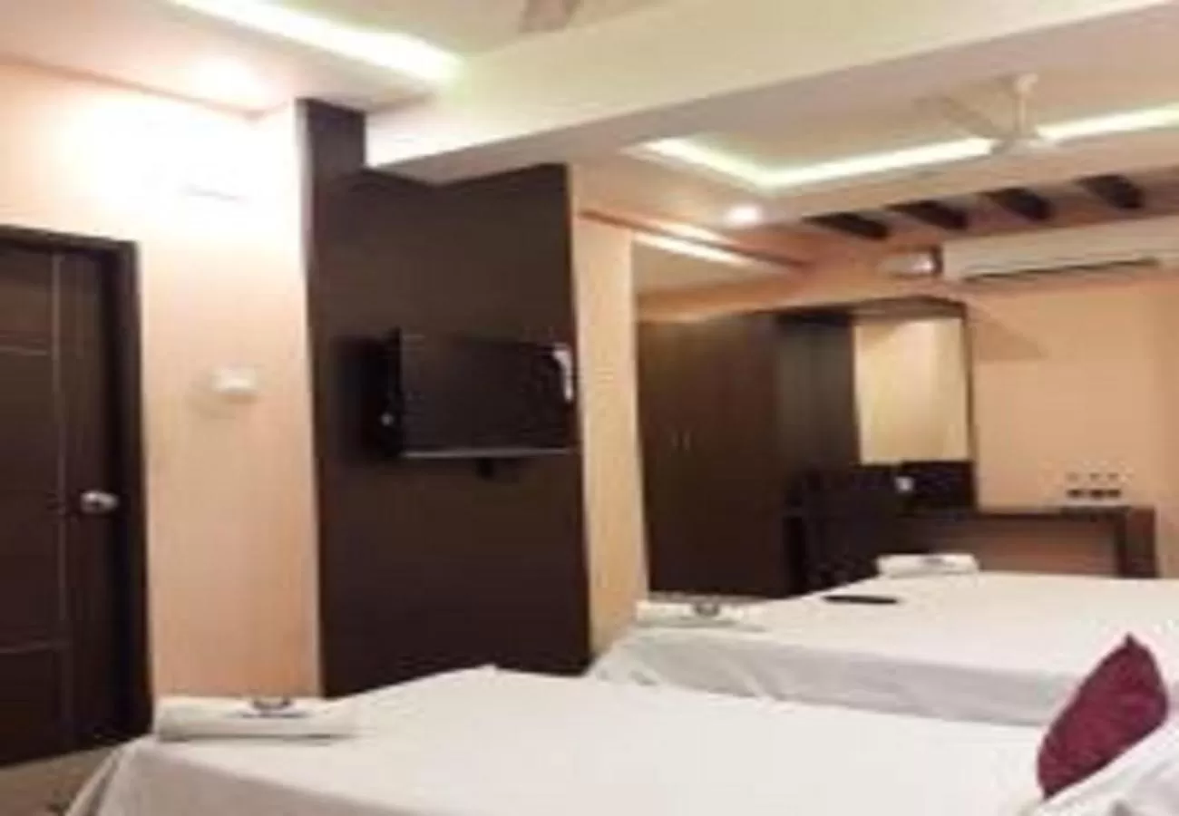 Bedroom in Hotel Ramco Residency A/c