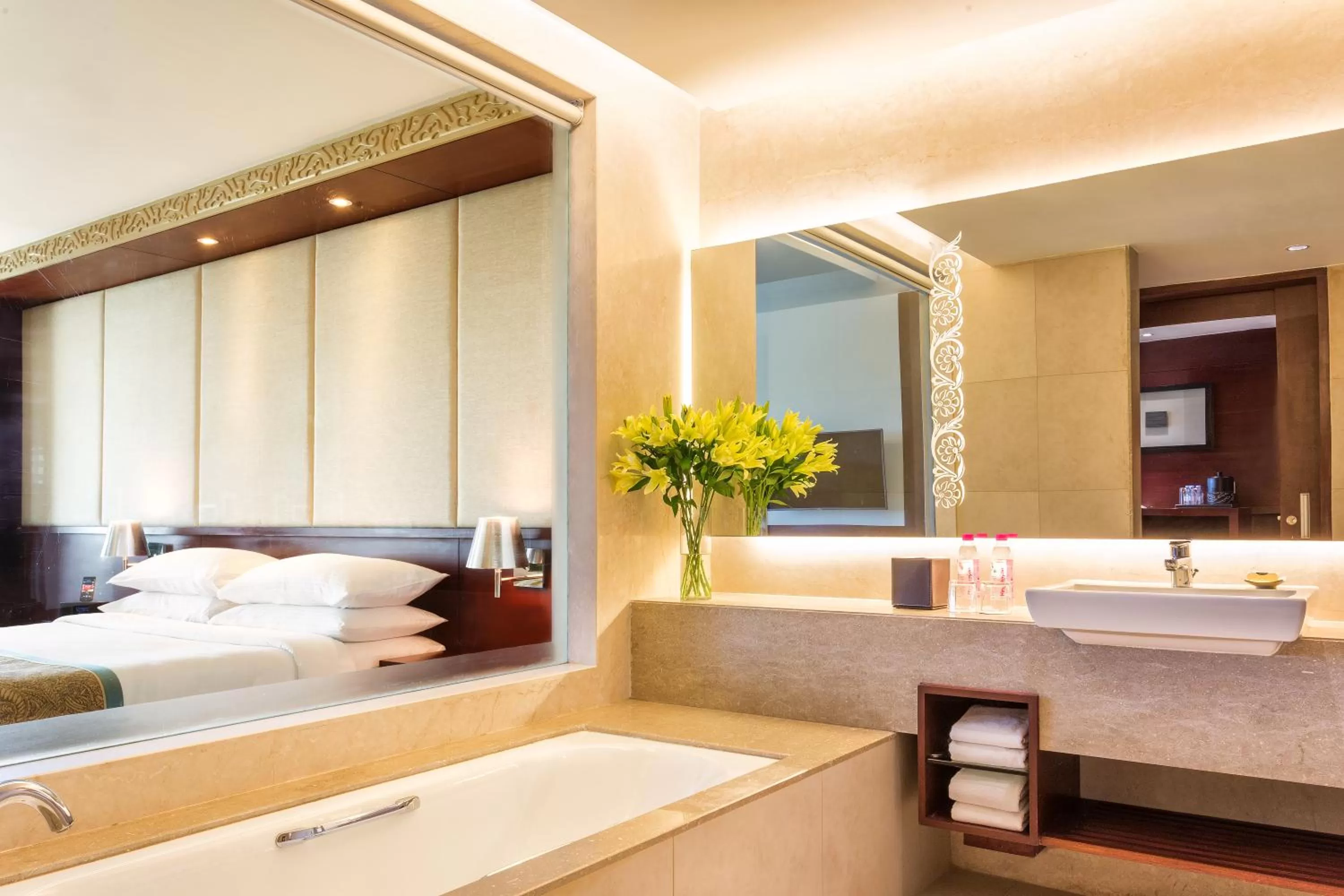 Bathroom, Bed in Crowne Plaza Ahmedabad City Centre by IHG